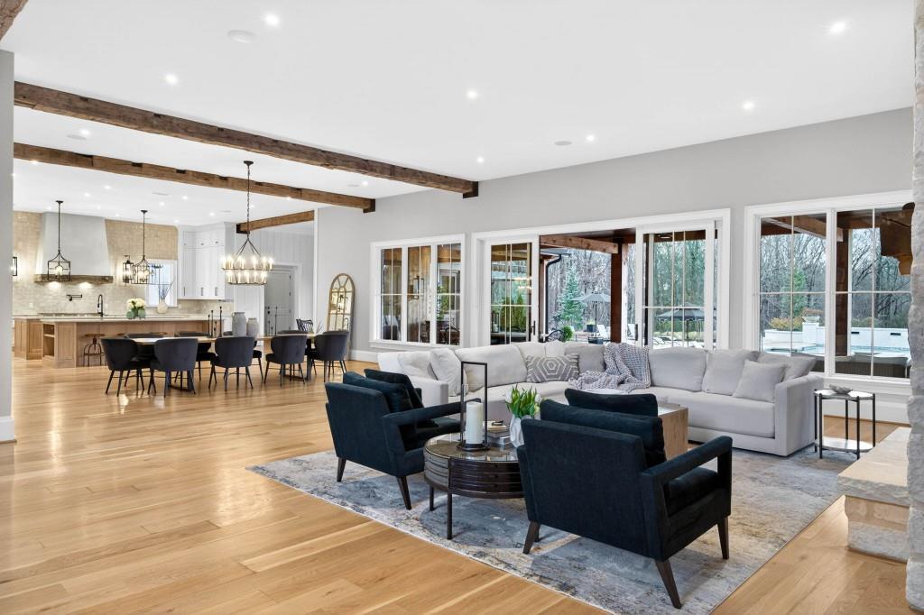 1050 Hamilton Road Northwest Kennesaw, GA 30152 - Photo 8 of 72 a living room with furniture and large windows