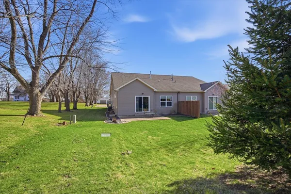 a view of a house with a big yard