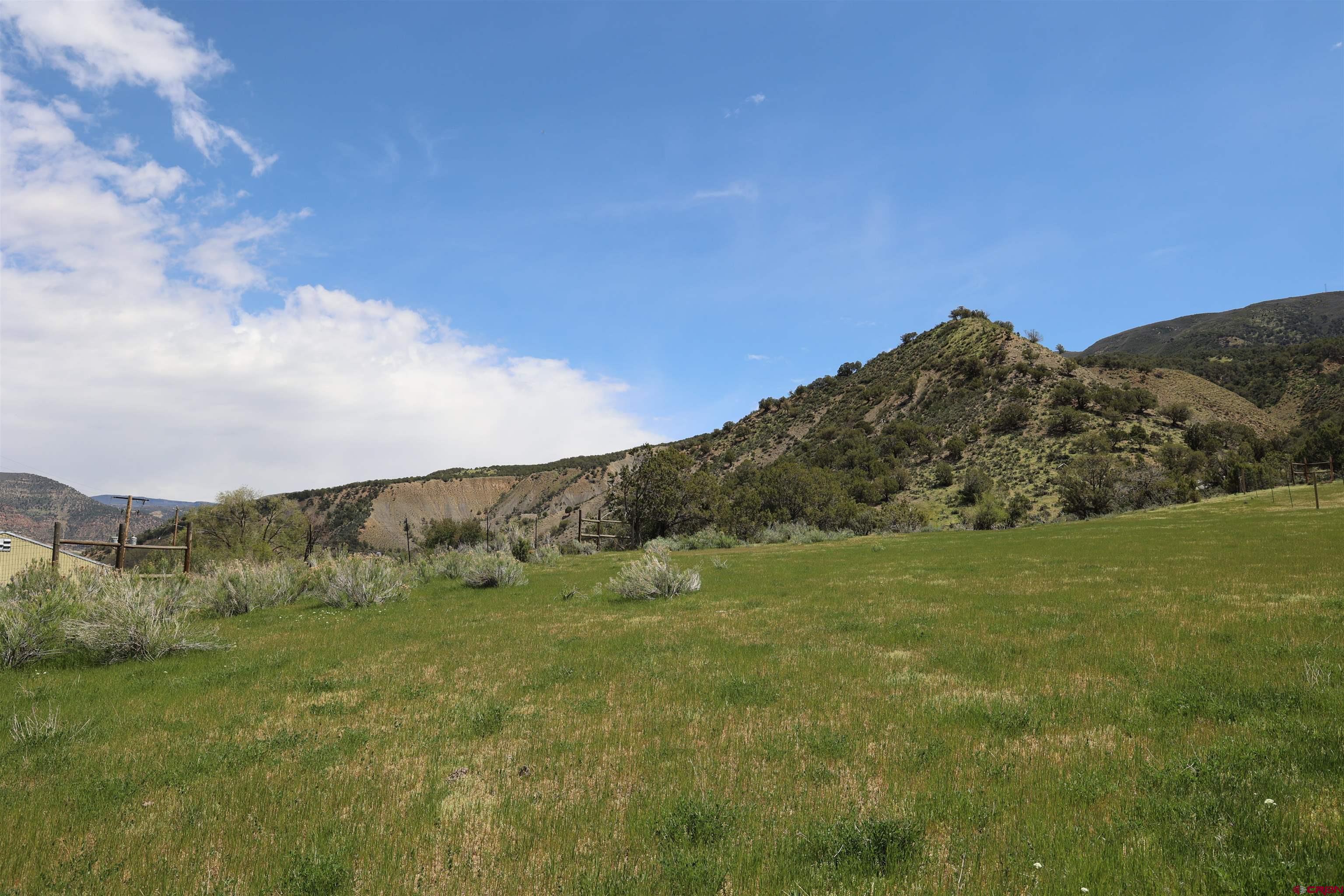 16619 Grange Road Paonia, CO 81428 - Photo 13 of 21 a view of a field with an ocean