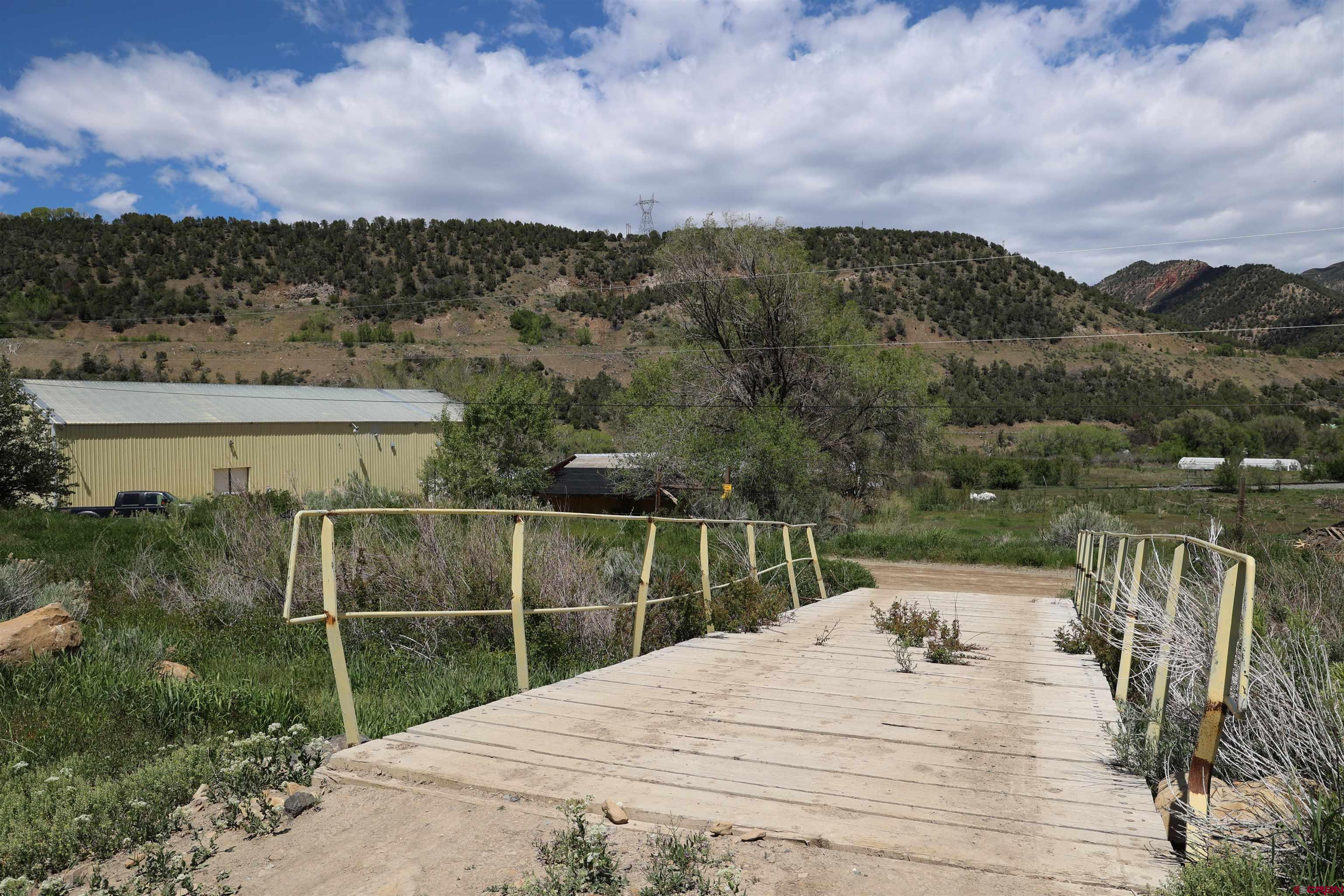 16619 Grange Road Paonia, CO 81428 - Photo 16 of 21 a view of a terrace with a garden
