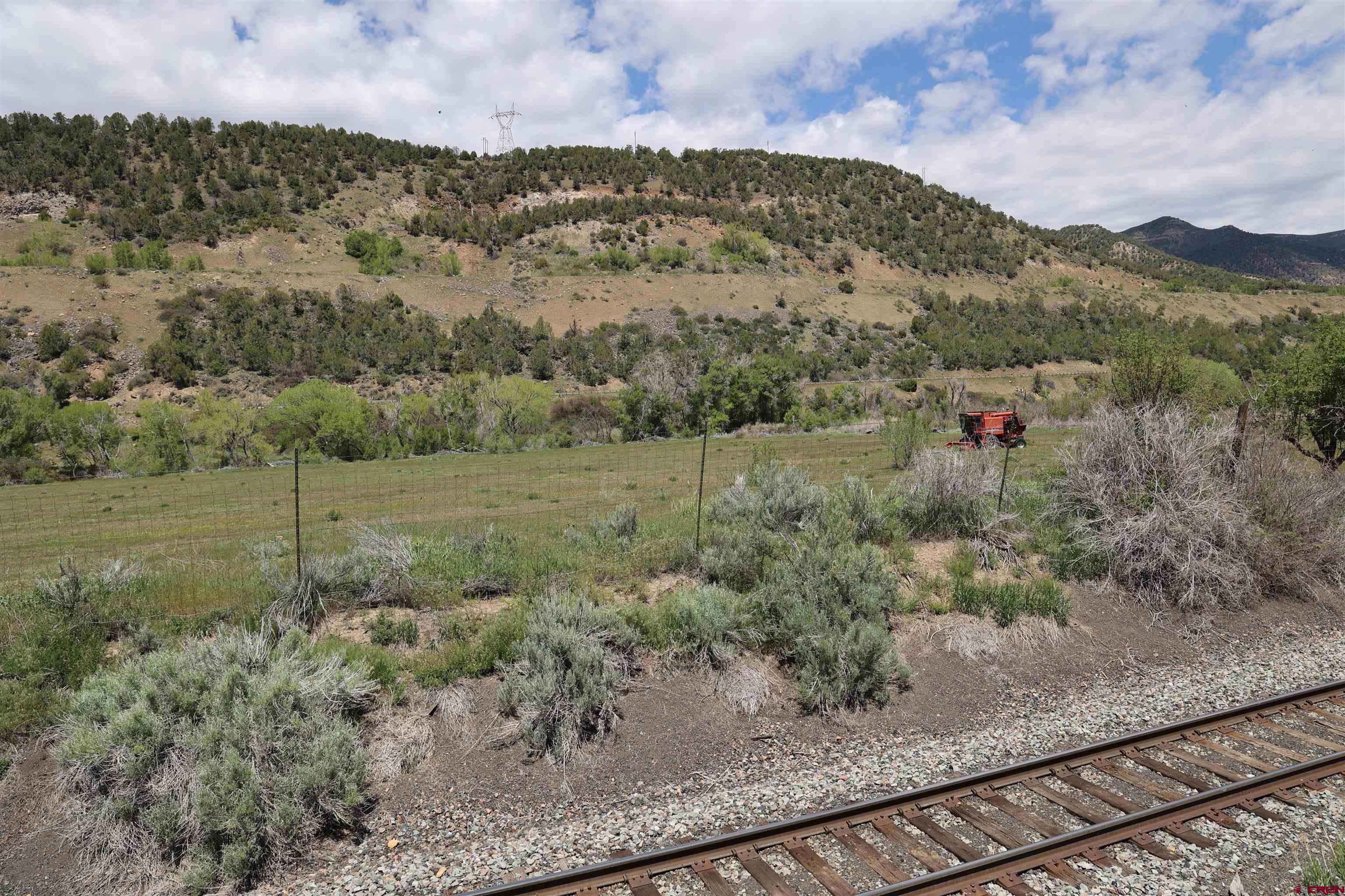 16619 Grange Road Paonia, CO 81428 - Photo 17 of 21 a view of a mountain in a field