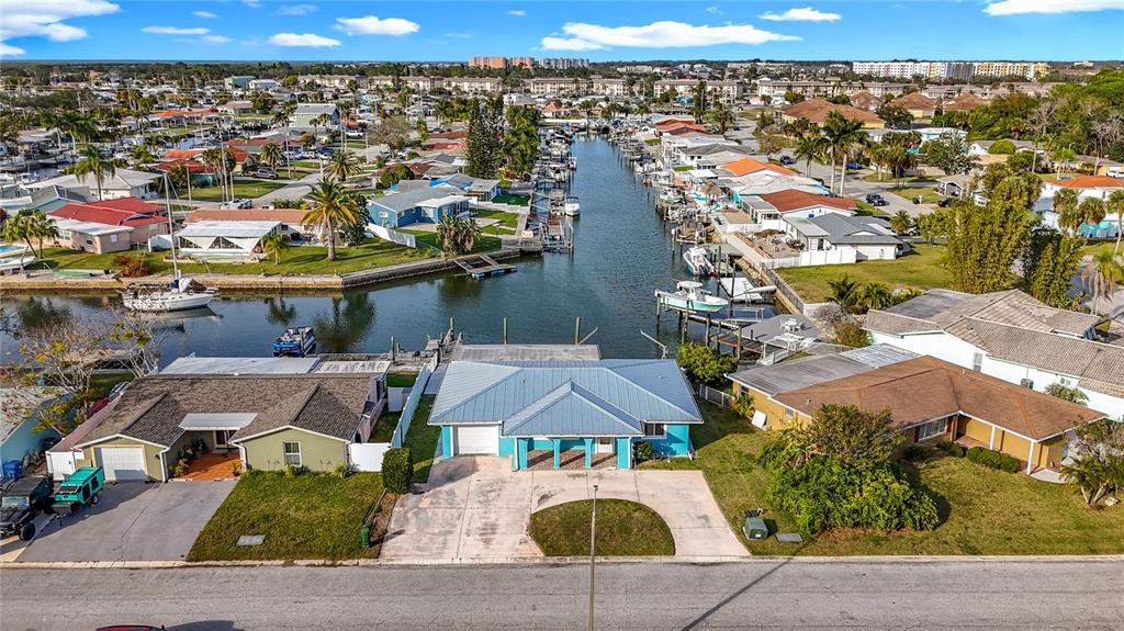 4869 Shell Stream Boulevard New Port Richey, FL 34652 - Photo 2 of 46 an aerial view of residential houses with outdoor space