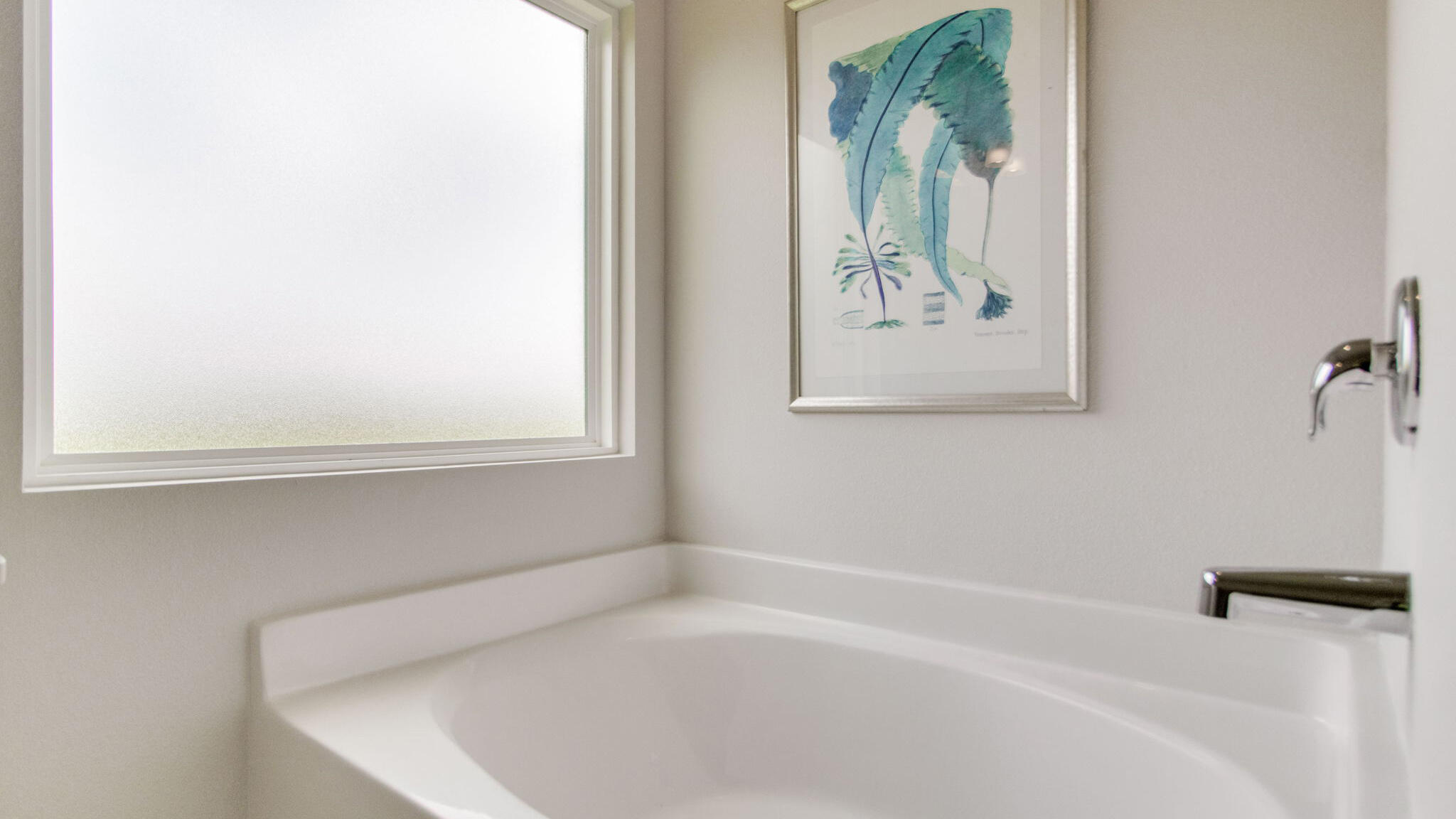 4666 Marine Loop Crestview, FL 32539 - Photo 19 of 38 a white bath tub sitting next to a window