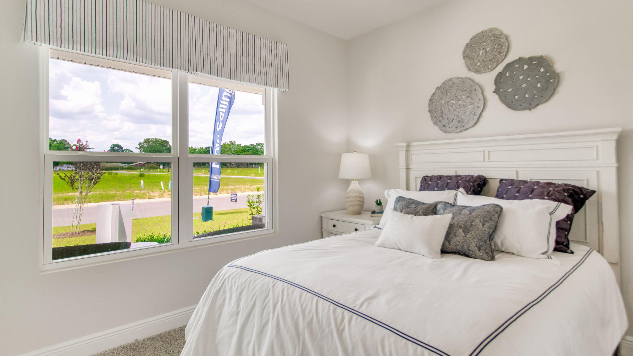 4666 Marine Loop Crestview, FL 32539 - Photo 24 of 38 a bedroom with a bed and a window