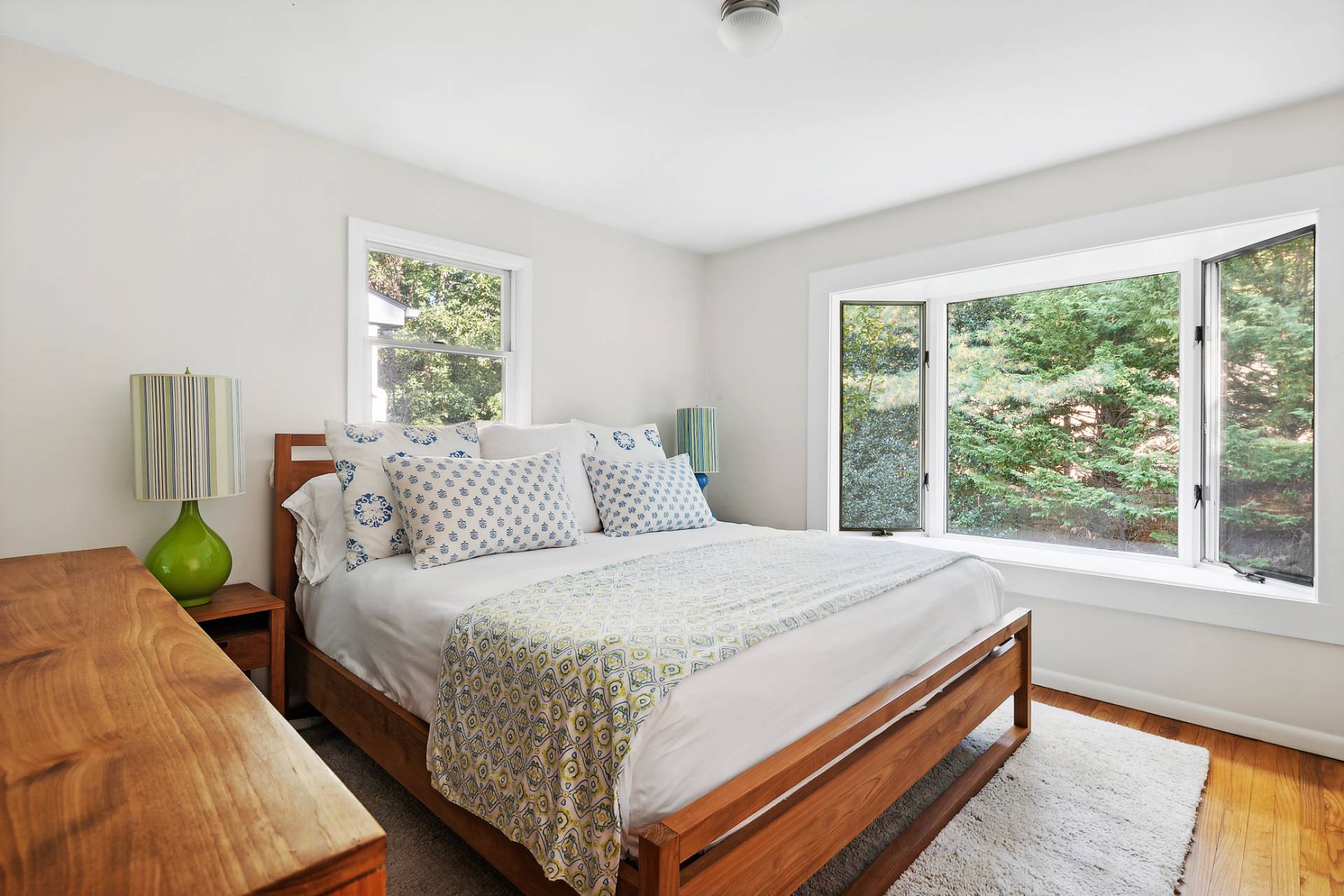 1214 Fireplace Road East Hampton, NY 11937 - Photo 13 of 19 a bedroom with a bed and a window