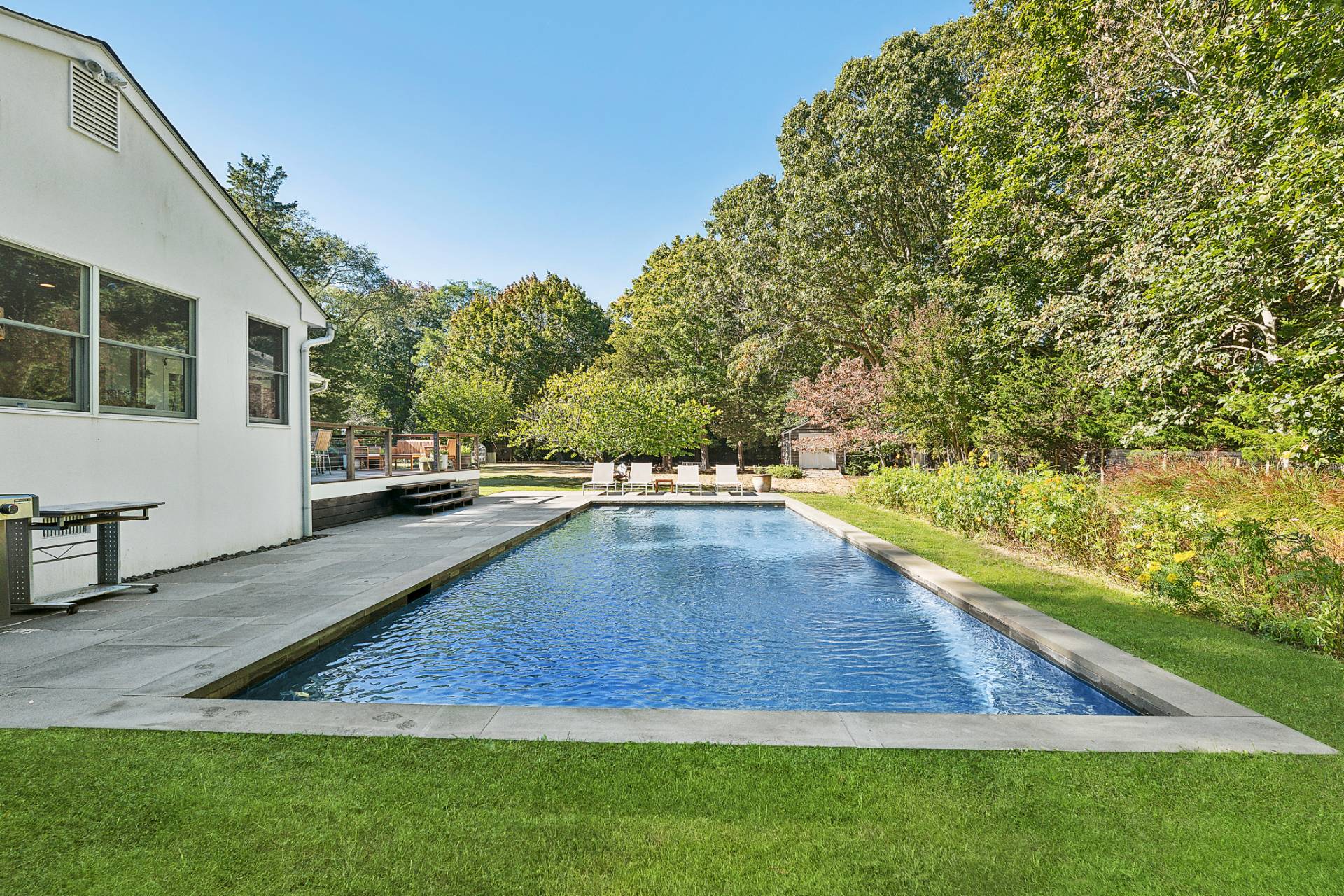 1214 Fireplace Road East Hampton, NY 11937 - Photo 14 of 19 a view of outdoor space yard and swimming pool