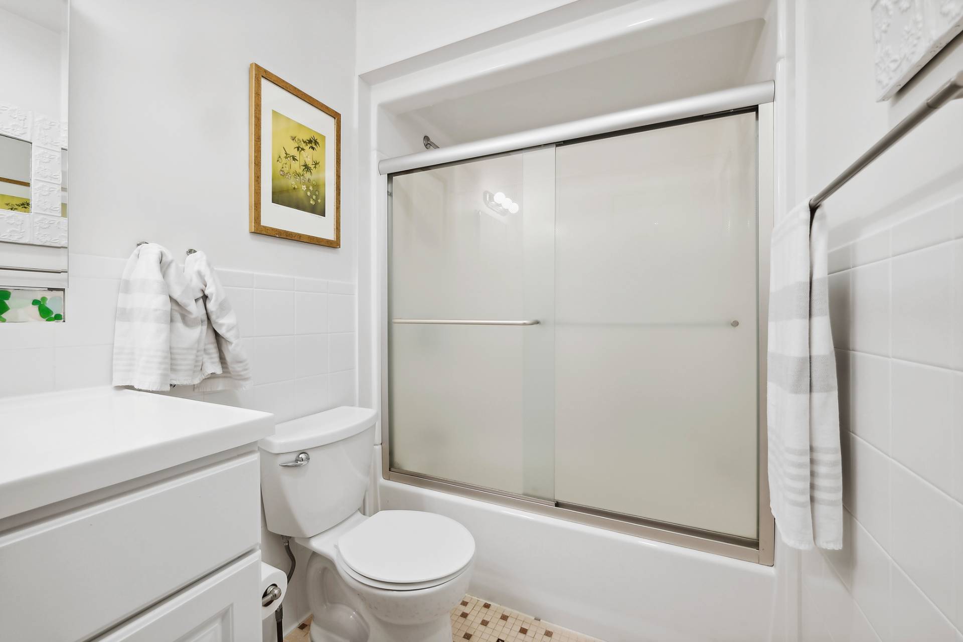 1214 Fireplace Road East Hampton, NY 11937 - Photo 14 of 19 a white toilet sitting next to a bathroom sink