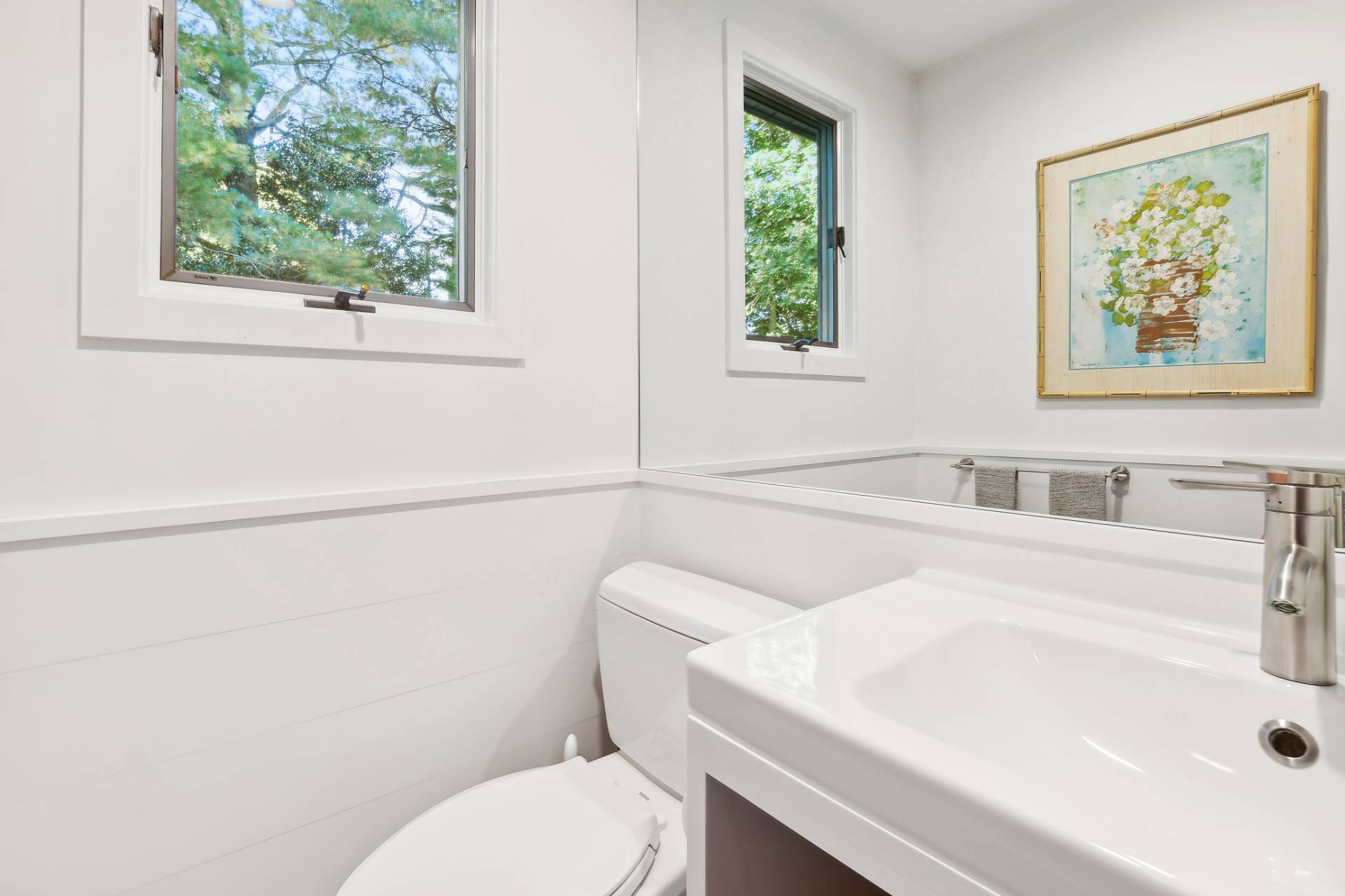 1214 Fireplace Road East Hampton, NY 11937 - Photo 18 of 19 a bathroom with a sink and a toilet
