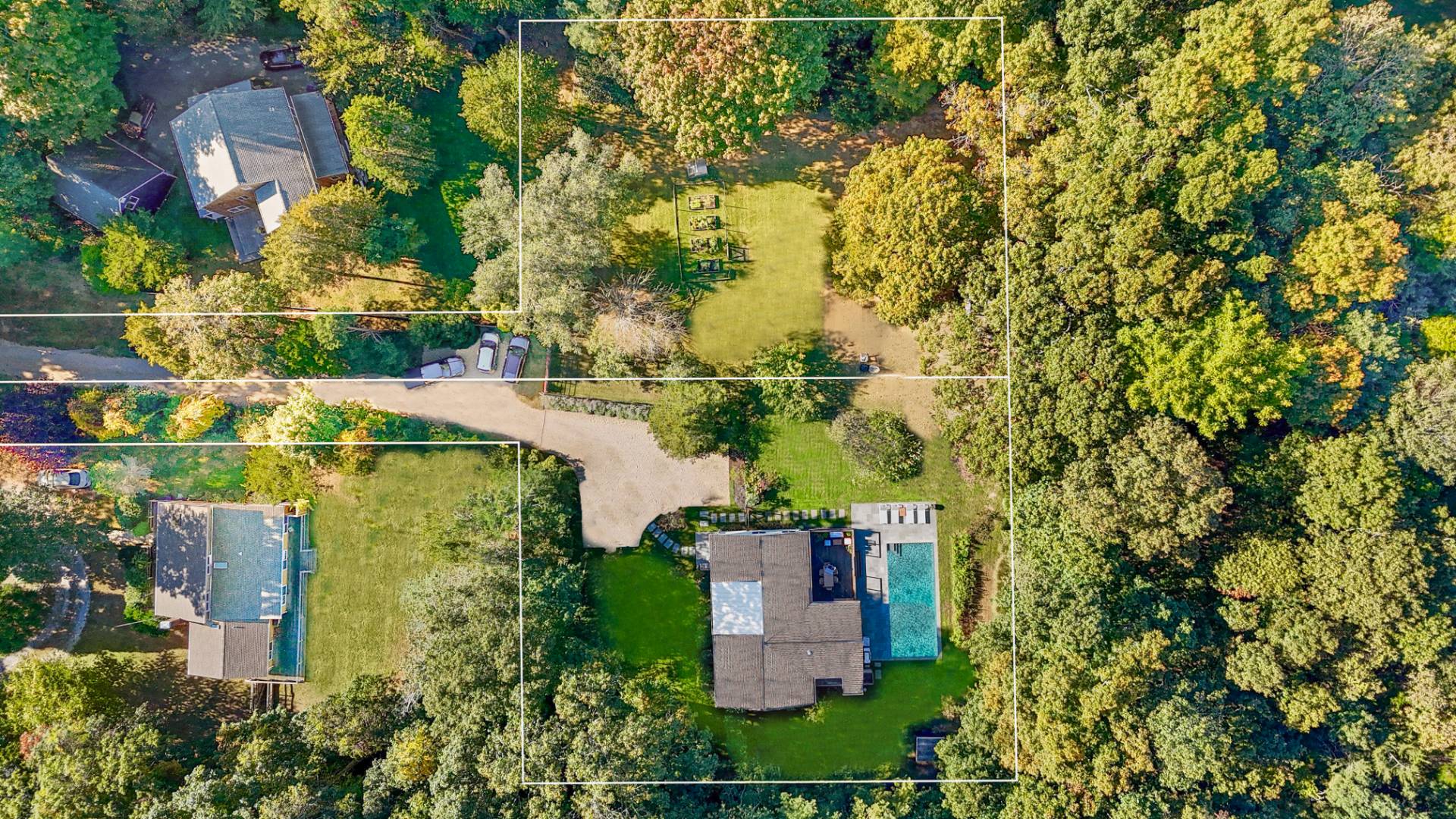 1214 Fireplace Road East Hampton, NY 11937 - Photo 2 of 19 an aerial view of residential house with outdoor space and trees around