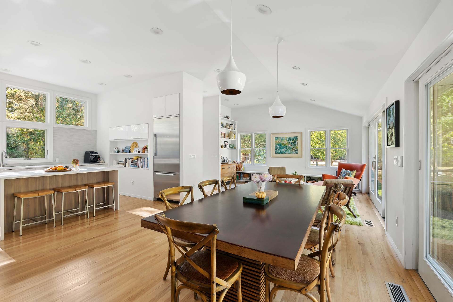 1214 Fireplace Road East Hampton, NY 11937 - Photo 3 of 19 a view of a dining room with furniture and wooden floor