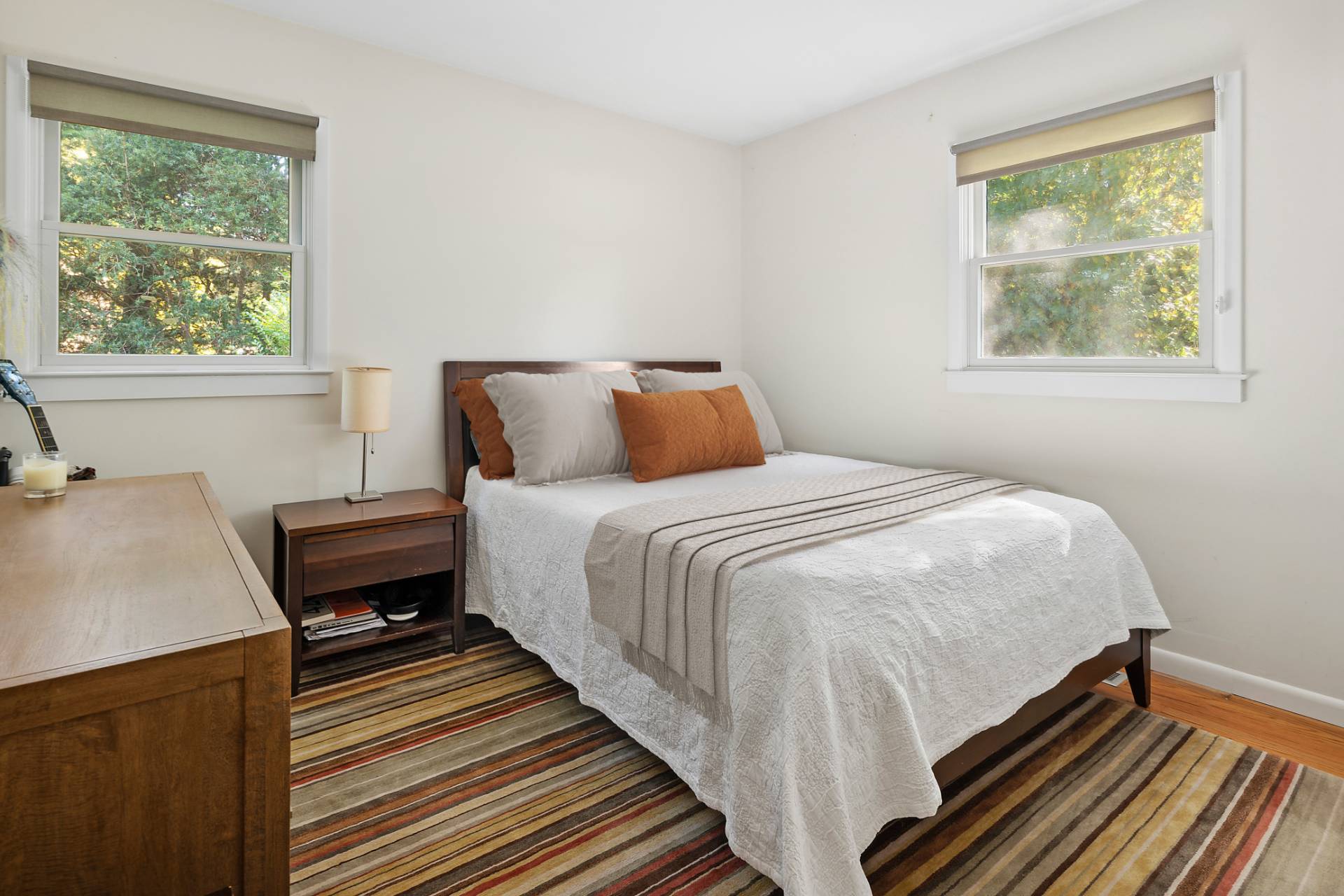 1214 Fireplace Road East Hampton, NY 11937 - Photo 7 of 19 a bedroom with a bed and wooden floor