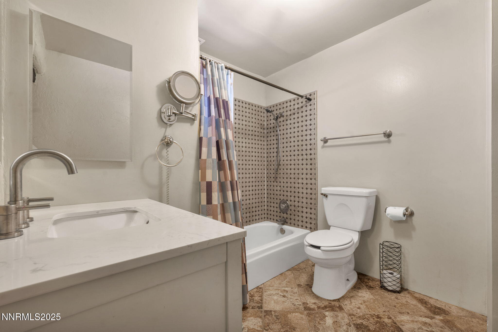 10810 Chesapeake Drive Reno, NV 89506 - Photo 21 of 34 a bathroom with a sink toilet and shower