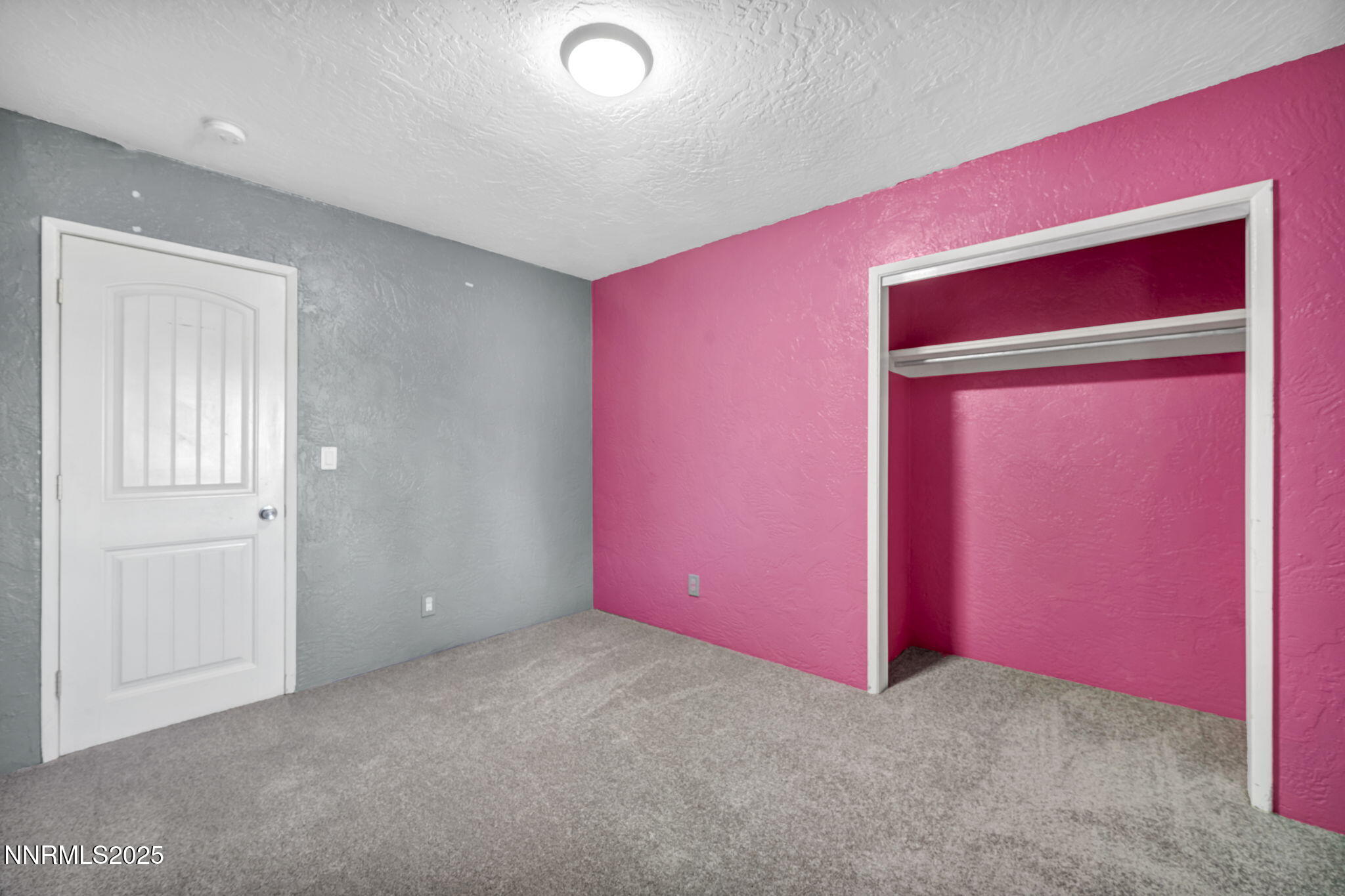 10810 Chesapeake Drive Reno, NV 89506 - Photo 25 of 34 an empty room with windows