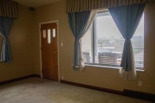 427 Marion Street Creighton, PA 15030 - Photo 8 of 20 a view of an empty room with a window