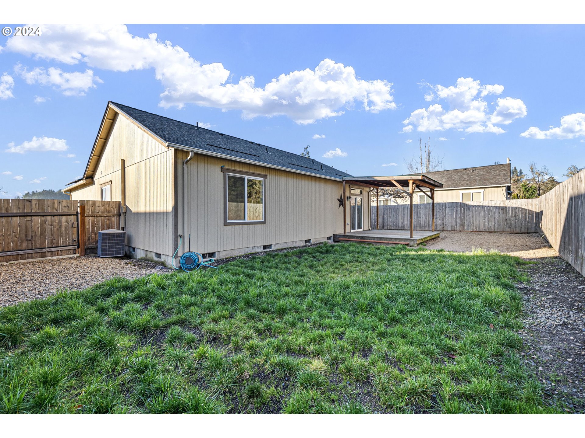 1529 South 59th Street Springfield, OR 97478 - Photo 34 of 38 a view of a house with backyard and sitting area