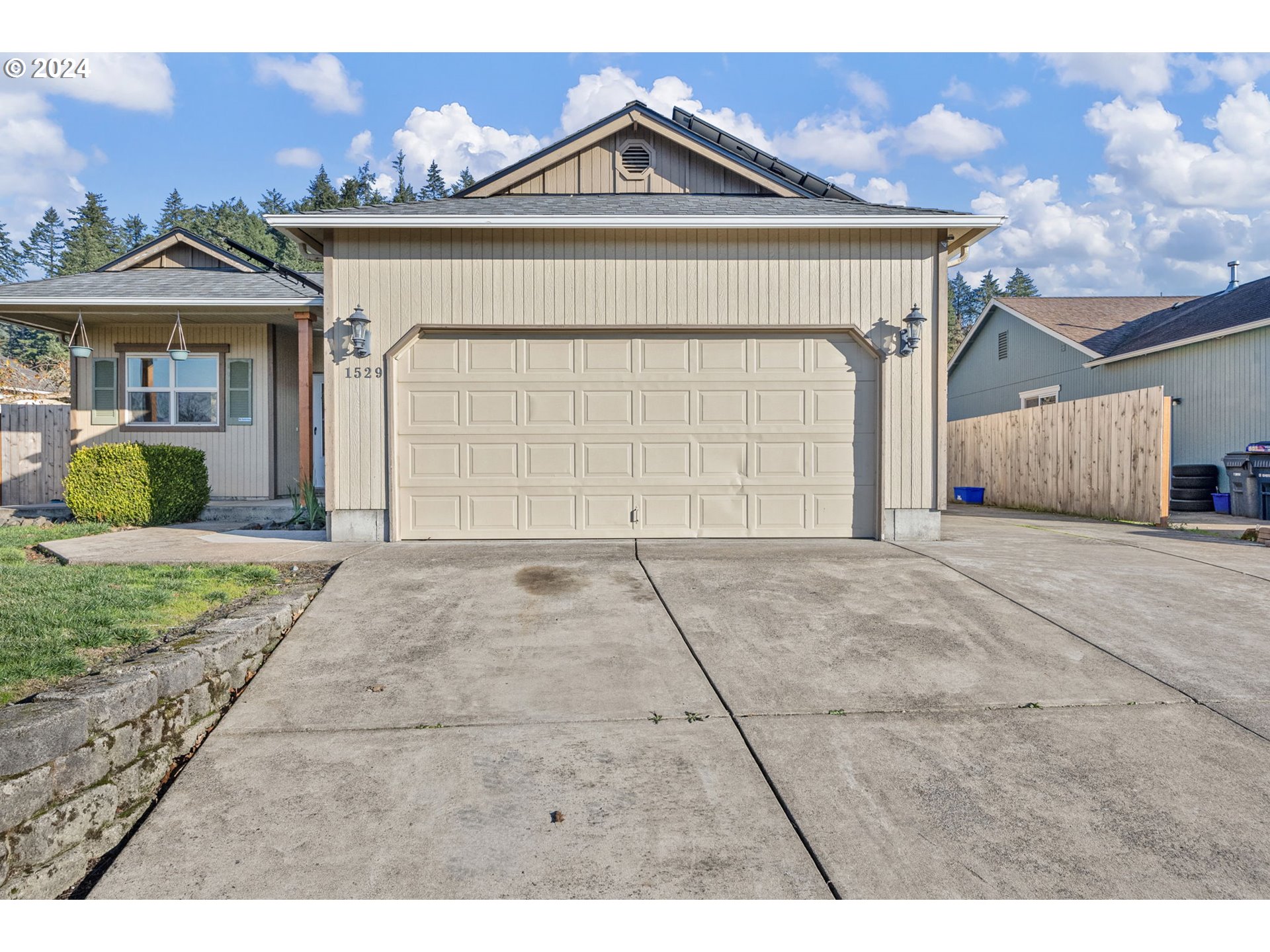 1529 South 59th Street Springfield, OR 97478 - Photo 37 of 38 a view of a house with a yard
