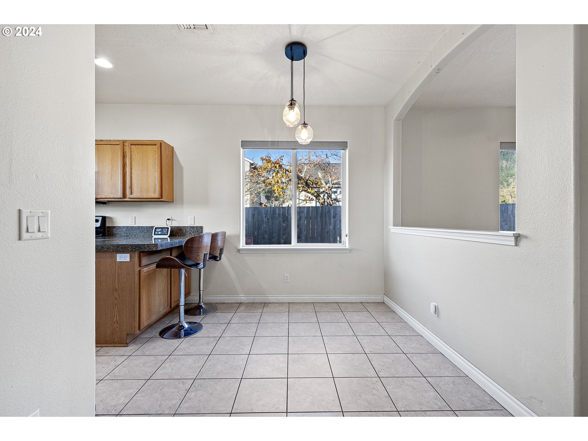 1529 South 59th Street Springfield, OR 97478 - Photo 8 of 38 a view of kitchen with furniture and window