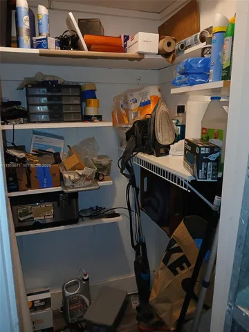 a room with storage and utility