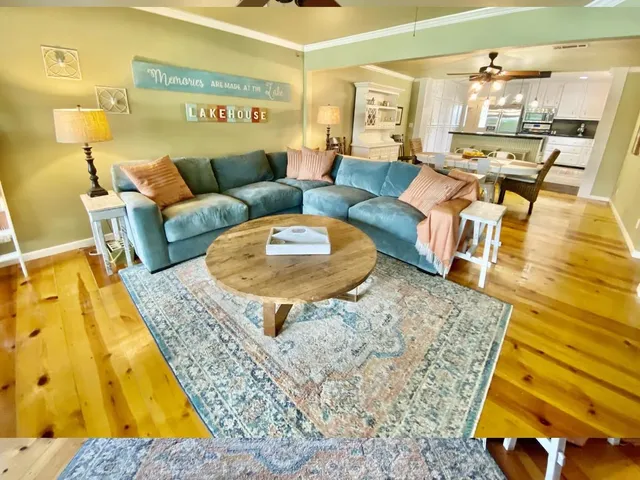 a living room with furniture and a table