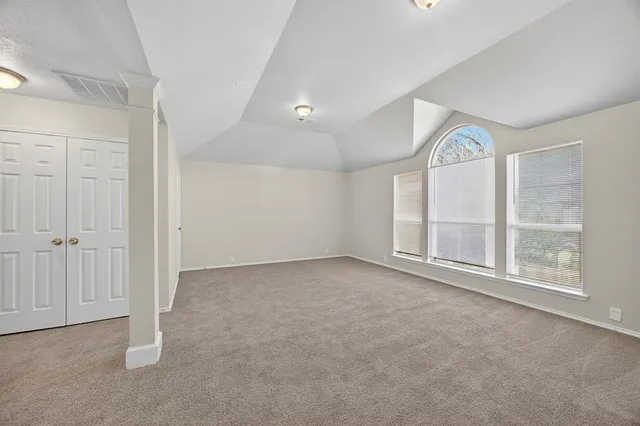 an empty room with windows