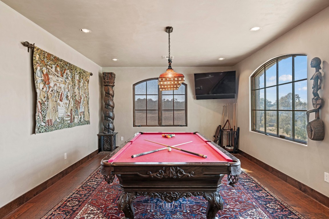 5801 Mount Gainor Road Wimberley, TX 78676 - Photo 16 of 40 Game room featuring recessed lighting, hardwood / wood-style flooring, and pool table