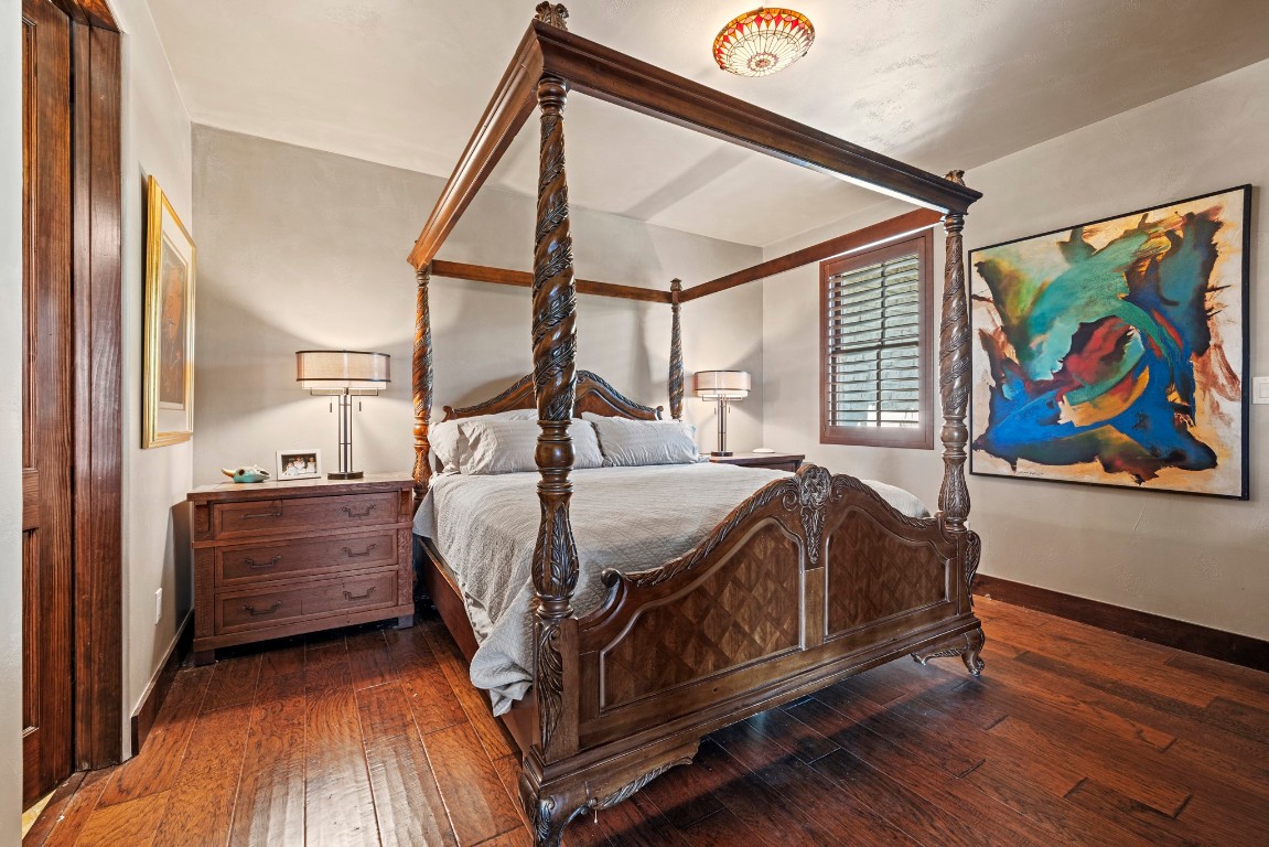 5801 Mount Gainor Road Wimberley, TX 78676 - Photo 20 of 40 Bedroom featuring hardwood / wood-style floors