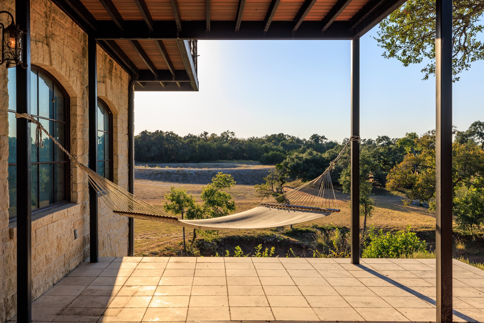 5801 Mount Gainor Road Wimberley, TX 78676 - Photo 24 of 40 a view of a ocean from a balcony