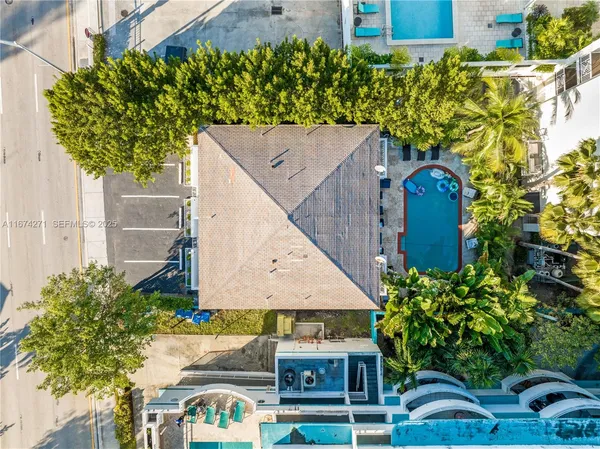 a view of a swimming pool with a patio