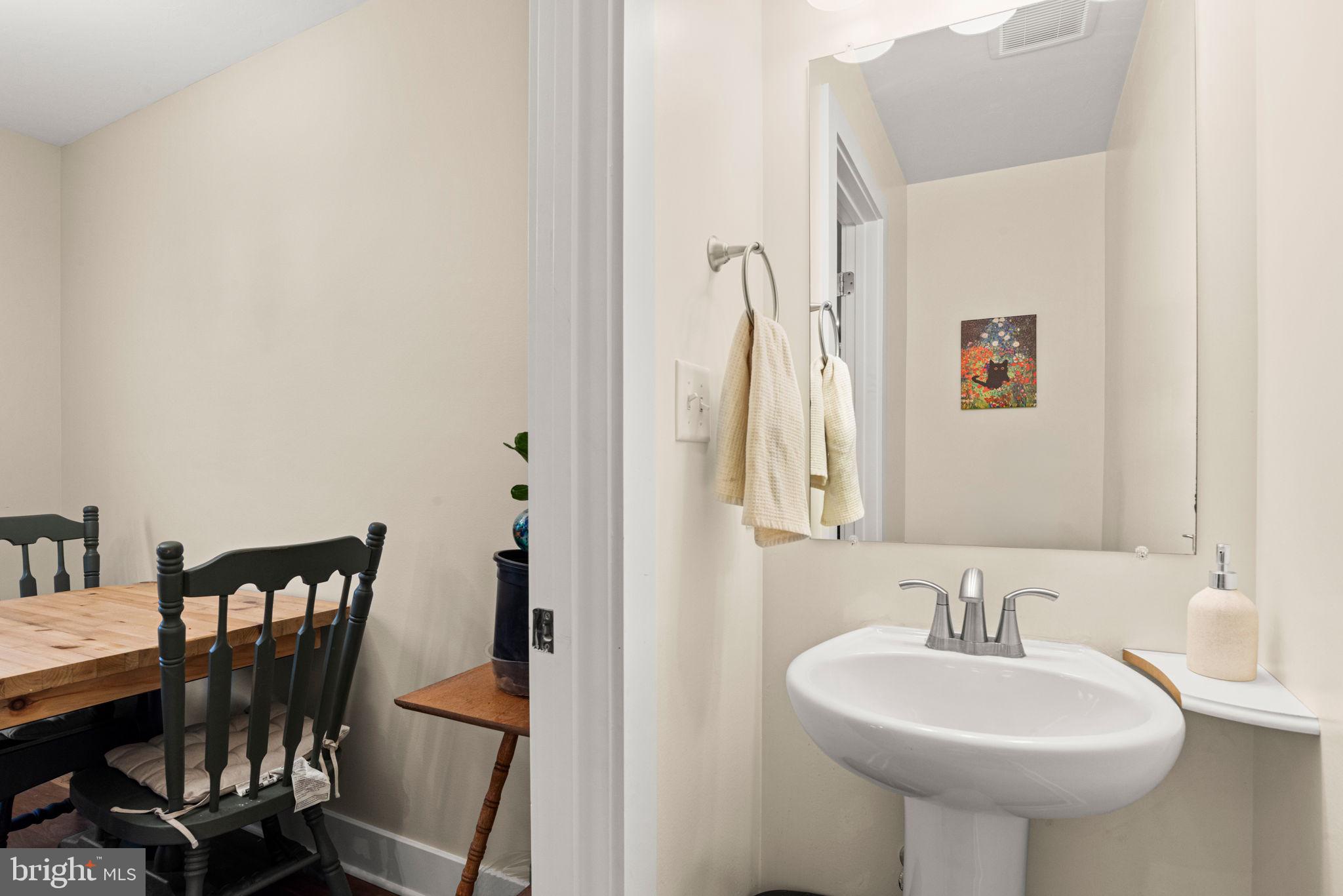 8796 Hillside Way Waynesboro, PA 17268 - Photo 15 of 31 a bathroom with a sink a mirror and a bathtub