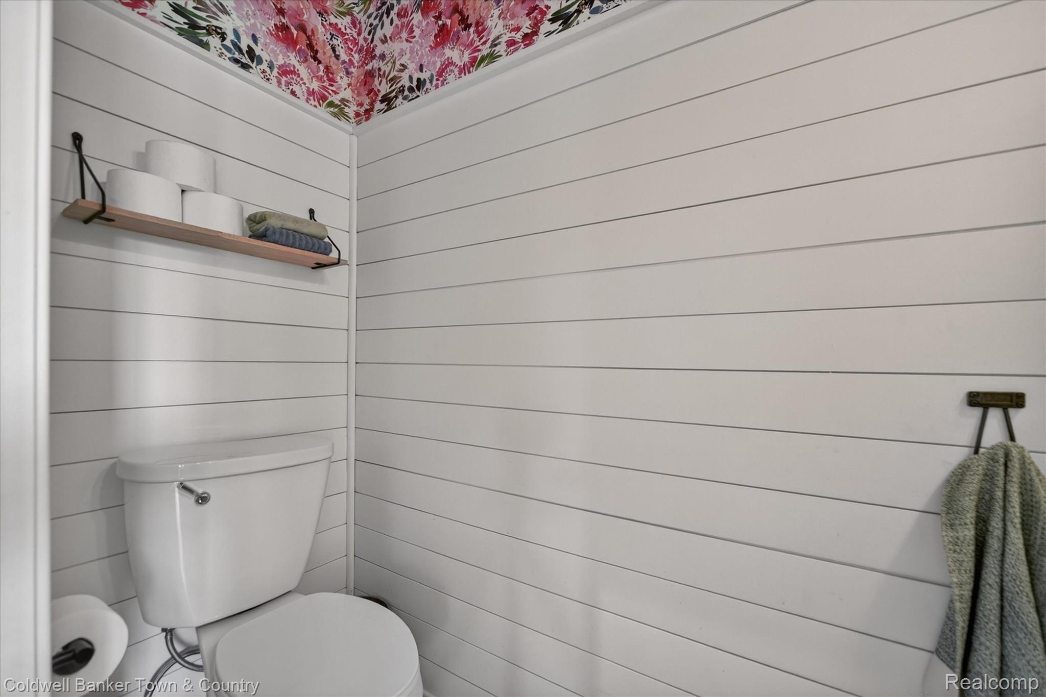 918 Gray Fox Court Howell, MI 48843 - Photo 23 of 84 White shiplap paneling and a floral wallpaper accent ceiling create visual interest