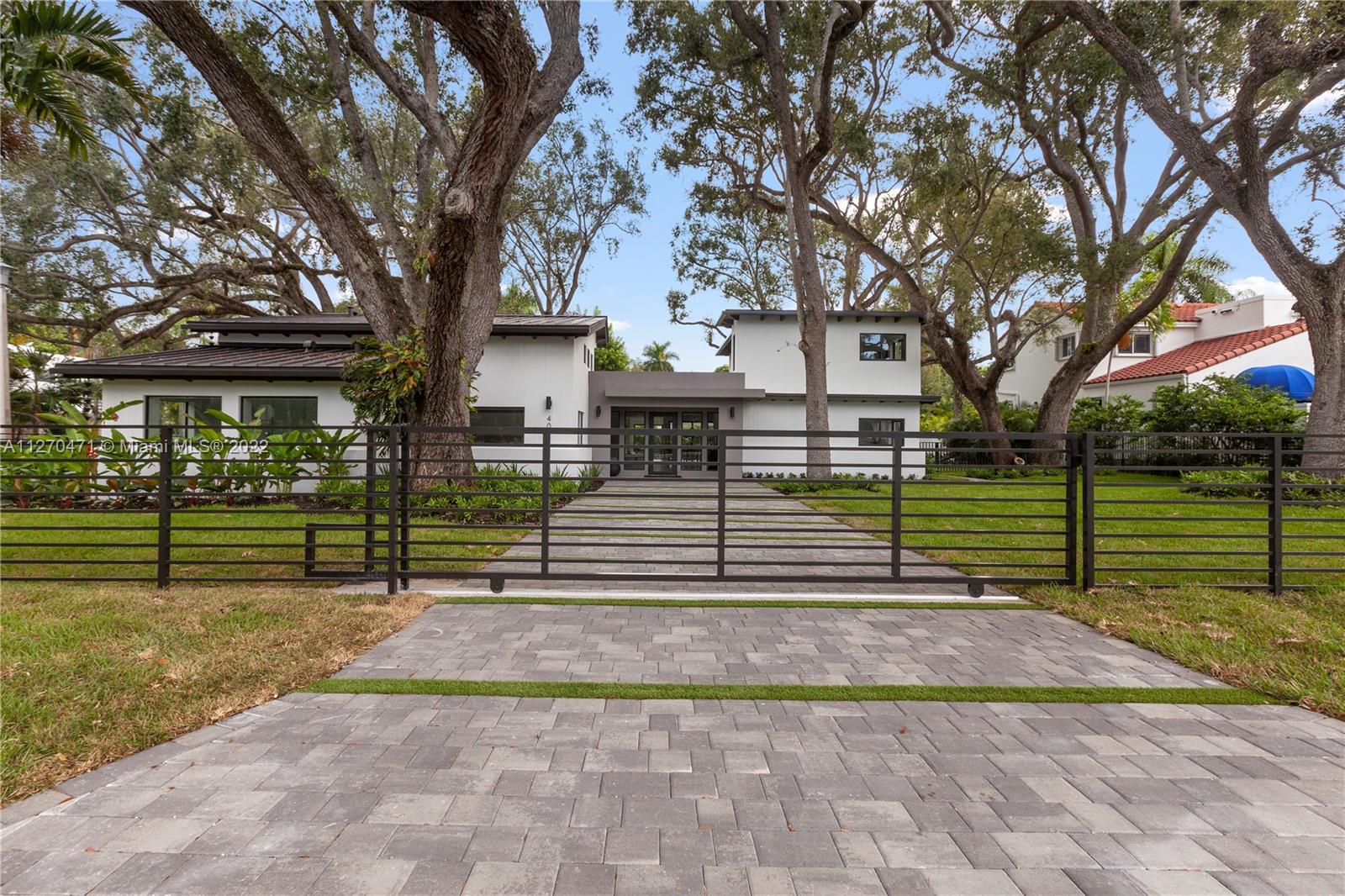 4095 Battersea Road Miami, FL 33133 - Photo 38 of 40 a view of a park with large trees