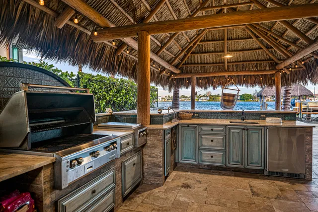 a view of an outdoor space with a table and chairs