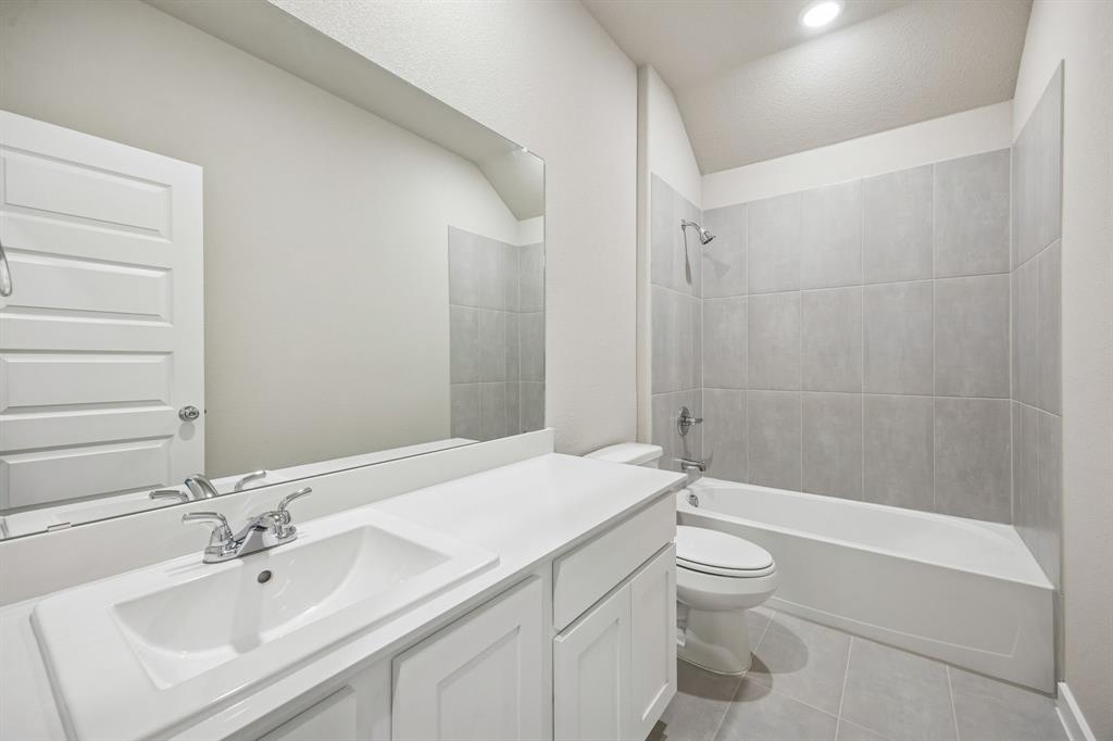 1404 Companero Street Haslet, TX 76052 - Photo 33 of 40 Bathroom in the Wimbledon home plan by Trophy Signature Homes – REPRESENTATIVE PHOTO