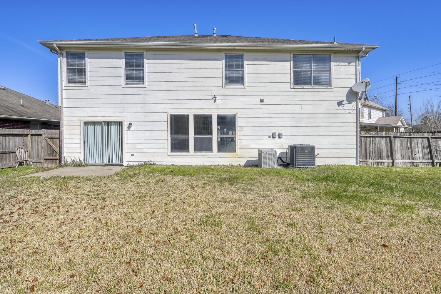 9351 Royal Way Houston, TX 77083 - Photo 21 of 22 View of back of the home from backyard...notice spacious backyard.