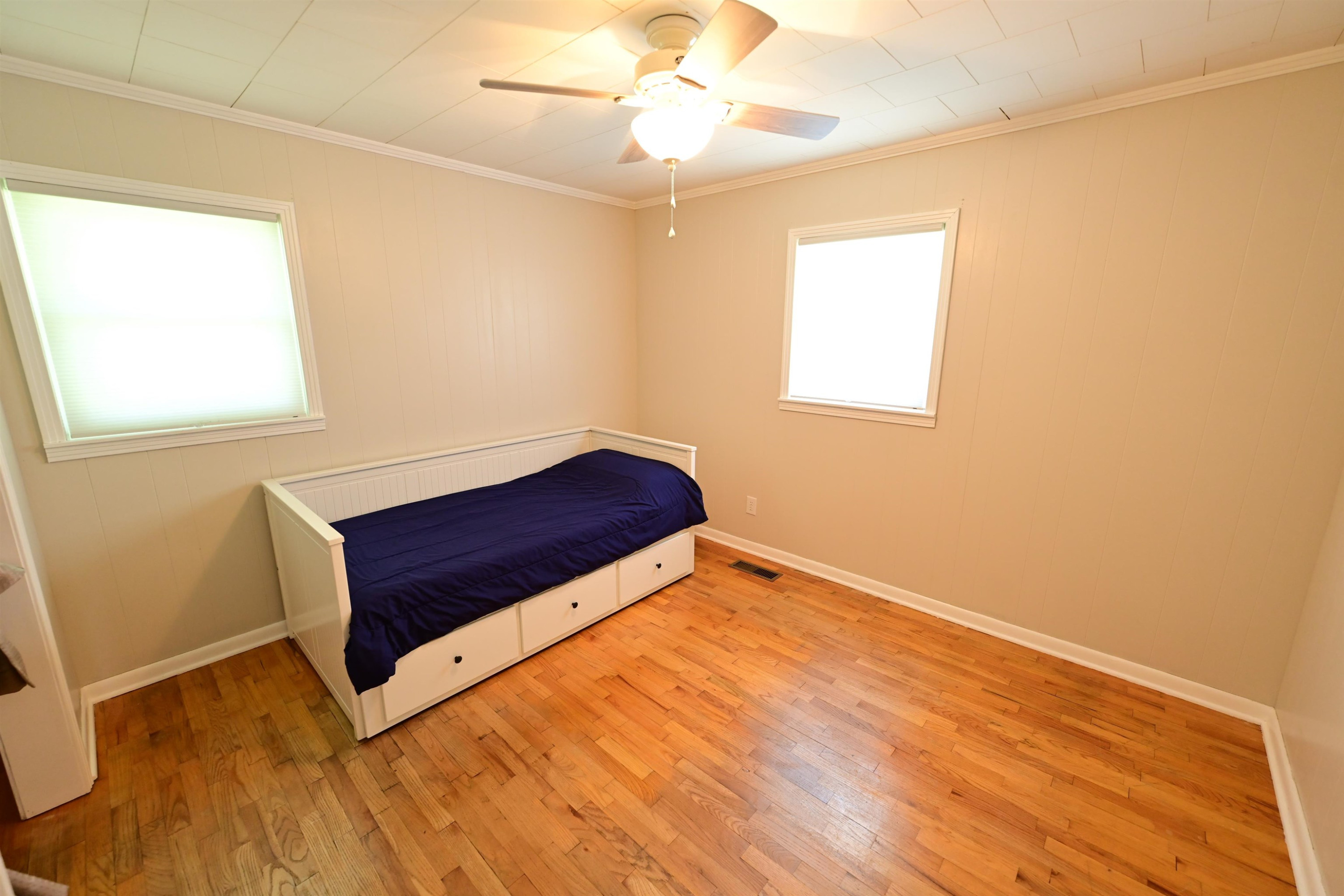 61 Johnny Dodd Road Newbern, TN 38059 - Photo 7 of 15 a room with a bed and a window