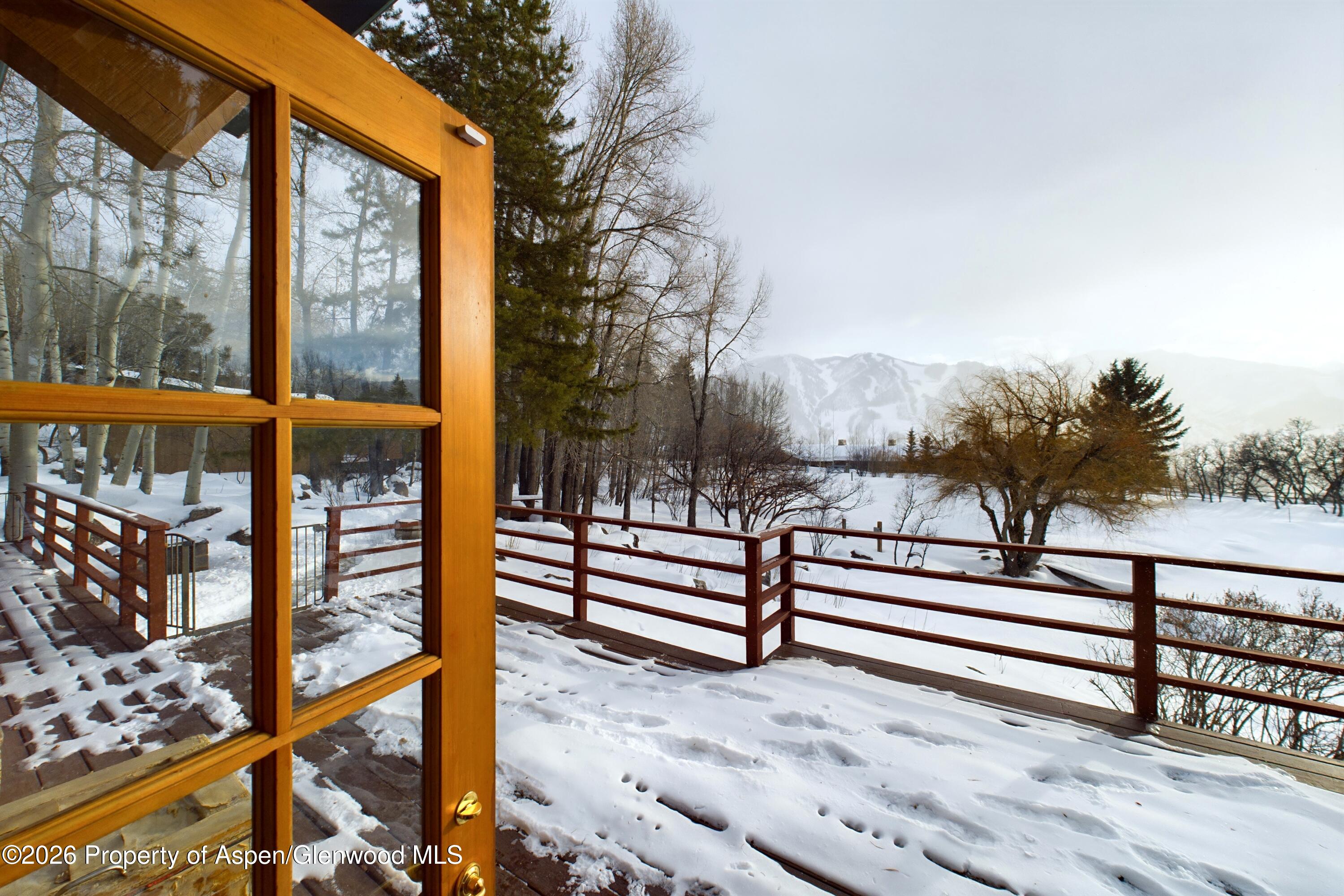 209 East Reds Road Aspen, CO 81612 - Photo 15 of 54 a view of a bench in the roof deck