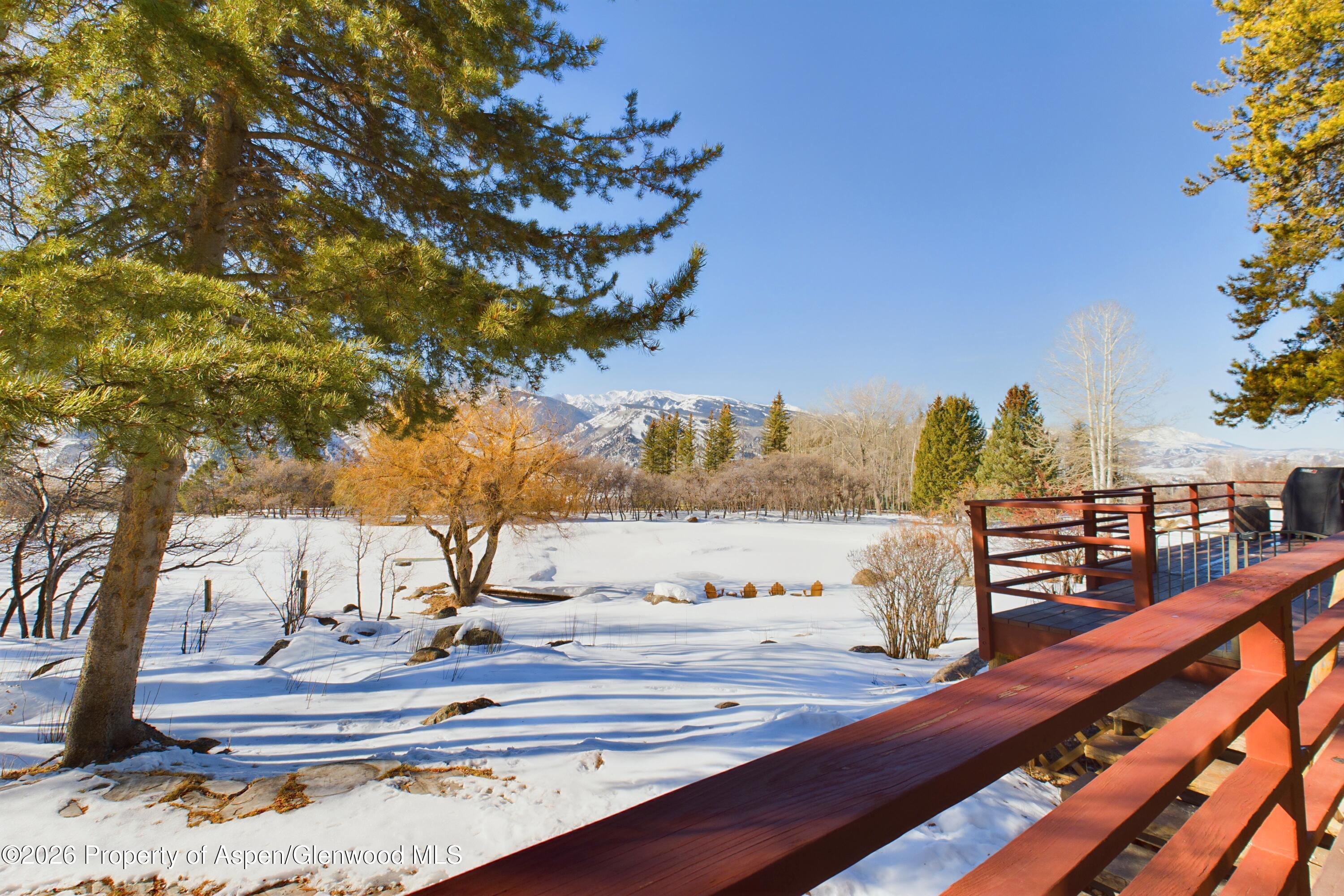209 East Reds Road Aspen, CO 81612 - Photo 19 of 54 a view of a lake with outdoor space