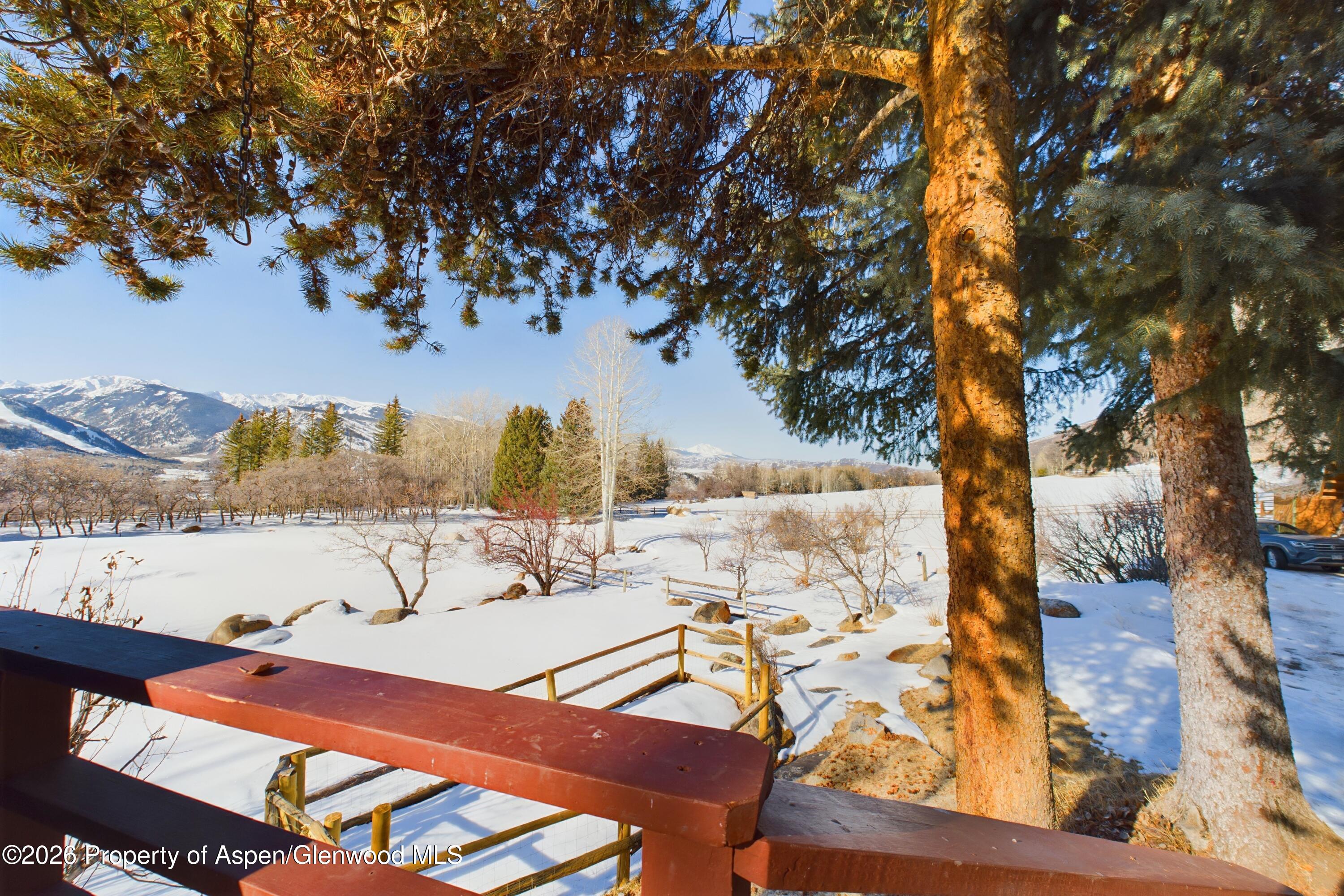 209 East Reds Road Aspen, CO 81612 - Photo 24 of 54 a view of a swimming pool with an outdoor seating