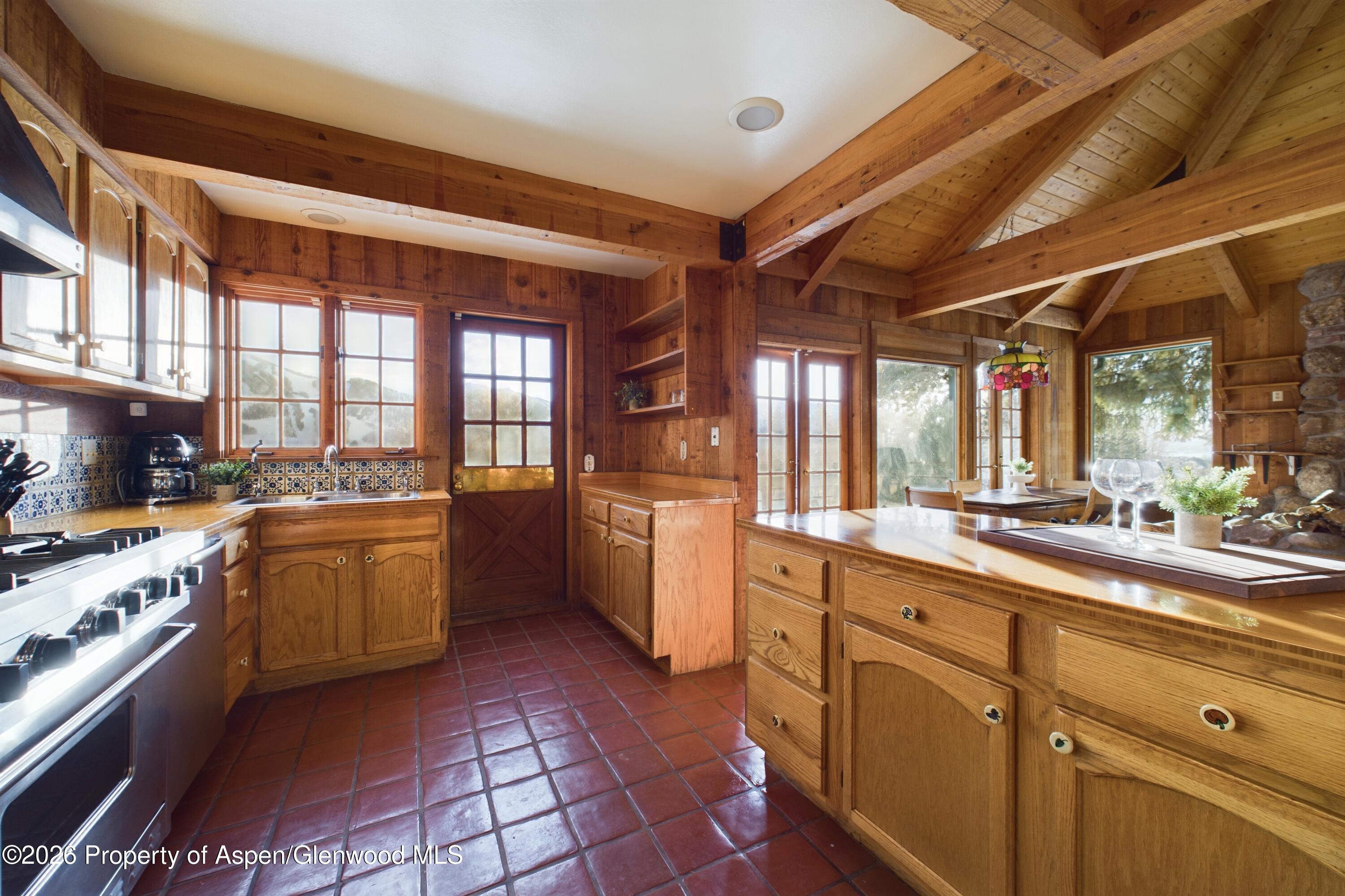 209 East Reds Road Aspen, CO 81612 - Photo 27 of 54 a large kitchen with a large window