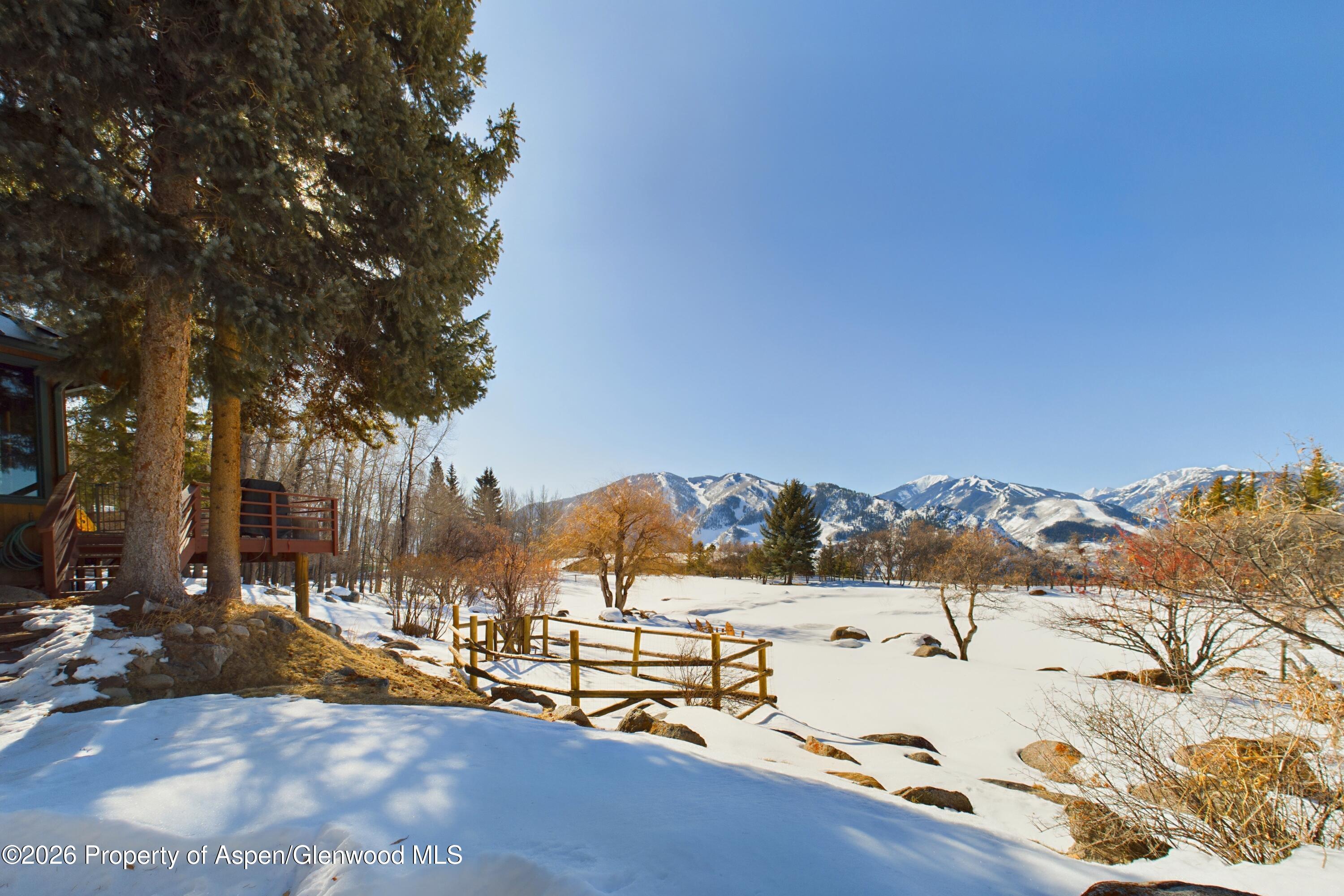209 East Reds Road Aspen, CO 81612 - Photo 4 of 54 a view of a city with tall buildings