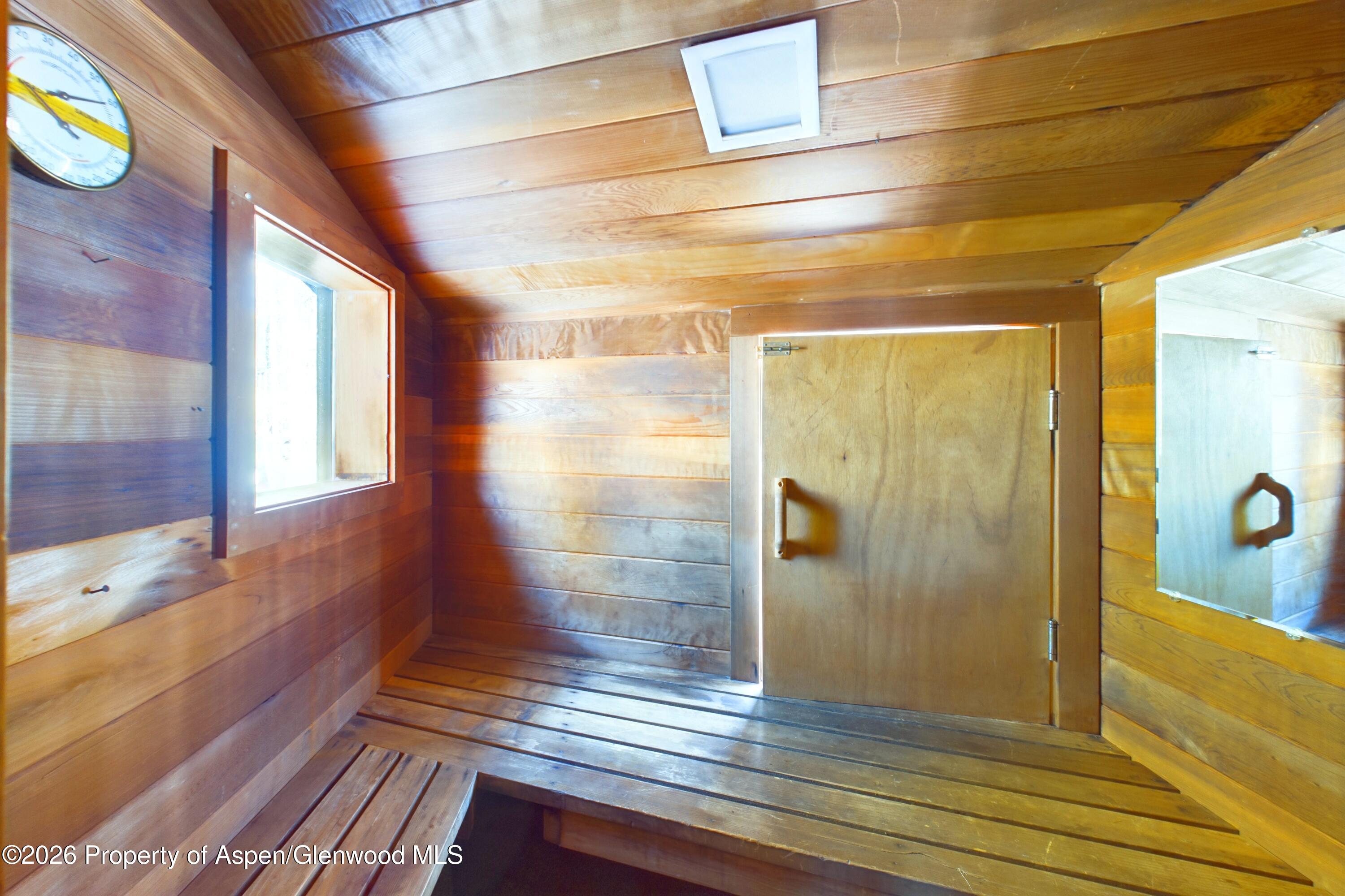 209 East Reds Road Aspen, CO 81612 - Photo 48 of 54 a view of wooden floor and windows in a room