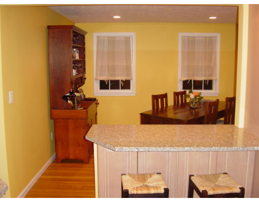 3 Harvard Road Framingham, MA 01701 - Photo 8 of 12 a kitchen with a sink and a refrigerator