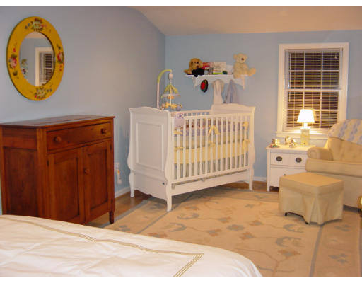 3 Harvard Road Framingham, MA 01701 - Photo 10 of 12 a bedroom with a bed and a window