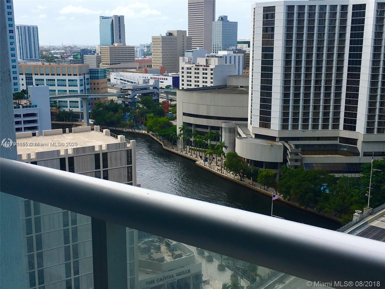 485 Brickell Avenue, Unit 1903 Miami, FL 33131 - Photo 7 of 8 a city view with tall buildings