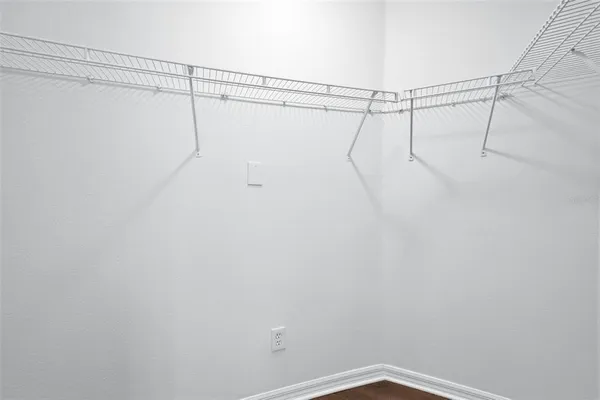 a view of a room with racks on the wall