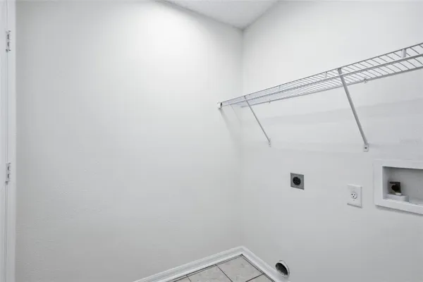 a view of a room with racks on the wall