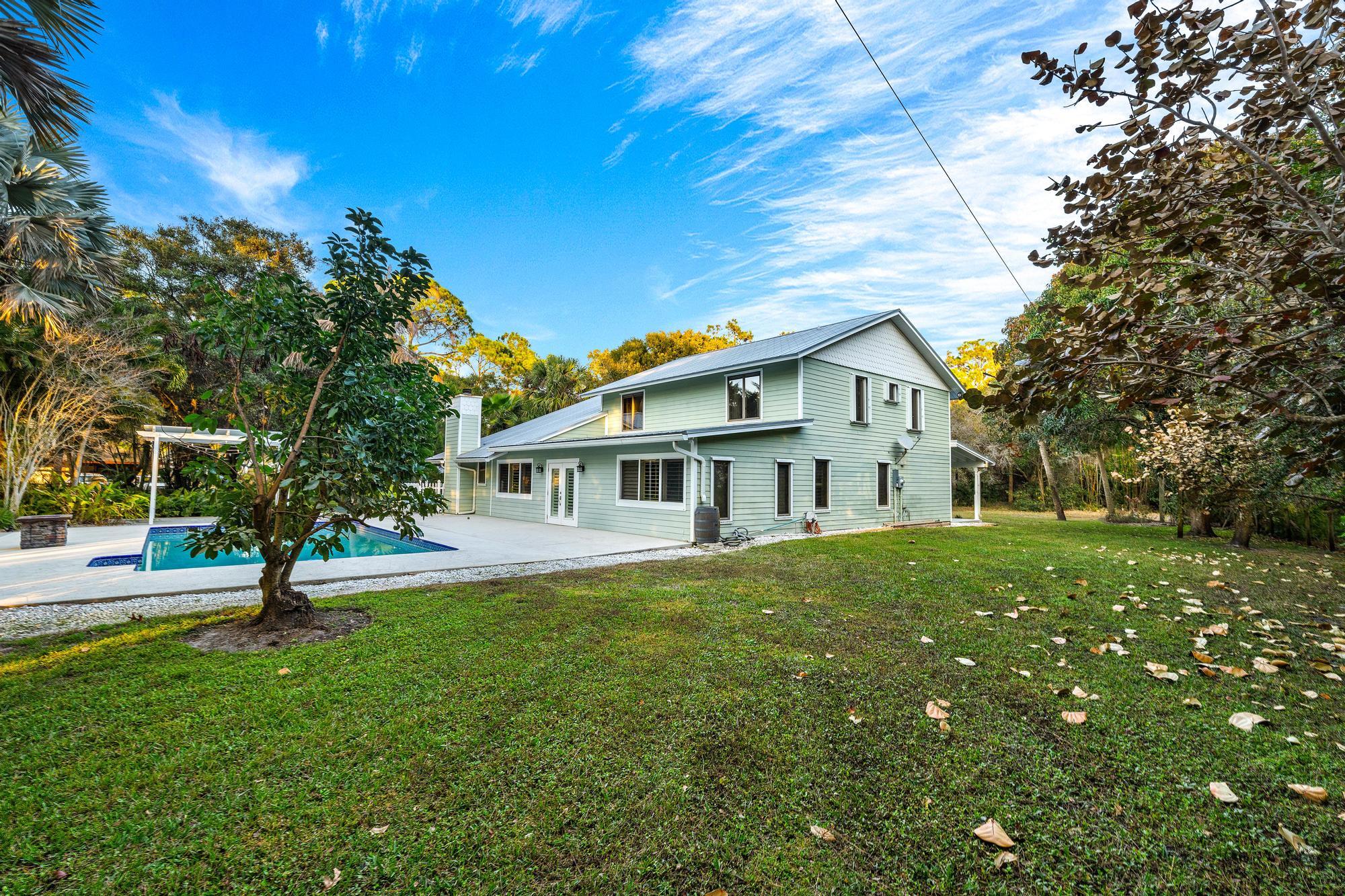 19150 Southeast Jupiter Road Jupiter, FL 33458 - Photo 30 of 57 Side Exterior