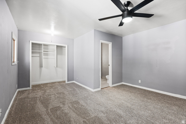 2576 Gramercy Avenue Ogden, UT 84401 - Photo 15 of 20 Unfurnished bedroom with a closet, carpet flooring, and a ceiling fan