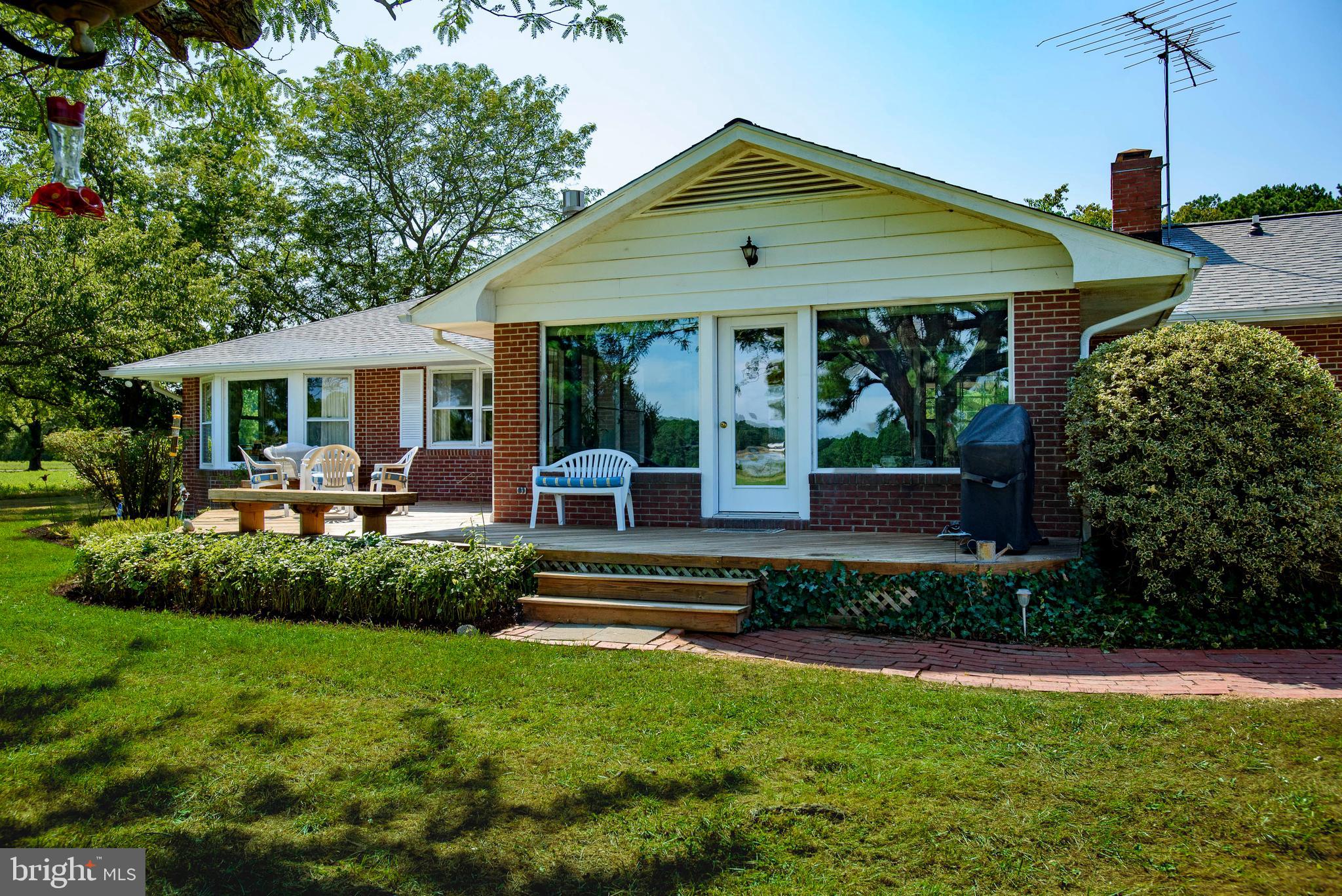 7221 Drum Point Road St. Michaels, MD 21663 - Photo 4 of 41 Sunroom and deck off back
