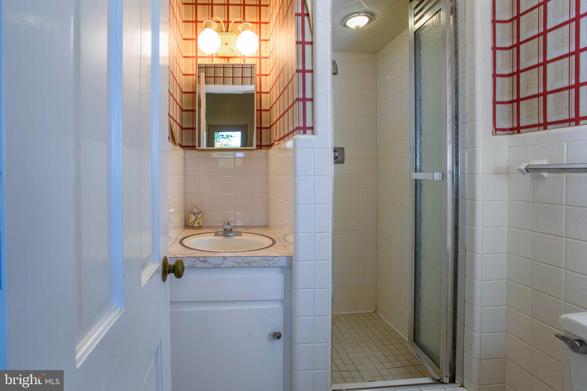 7221 Drum Point Road St. Michaels, MD 21663 - Photo 39 of 41 #3 full bath off laundry